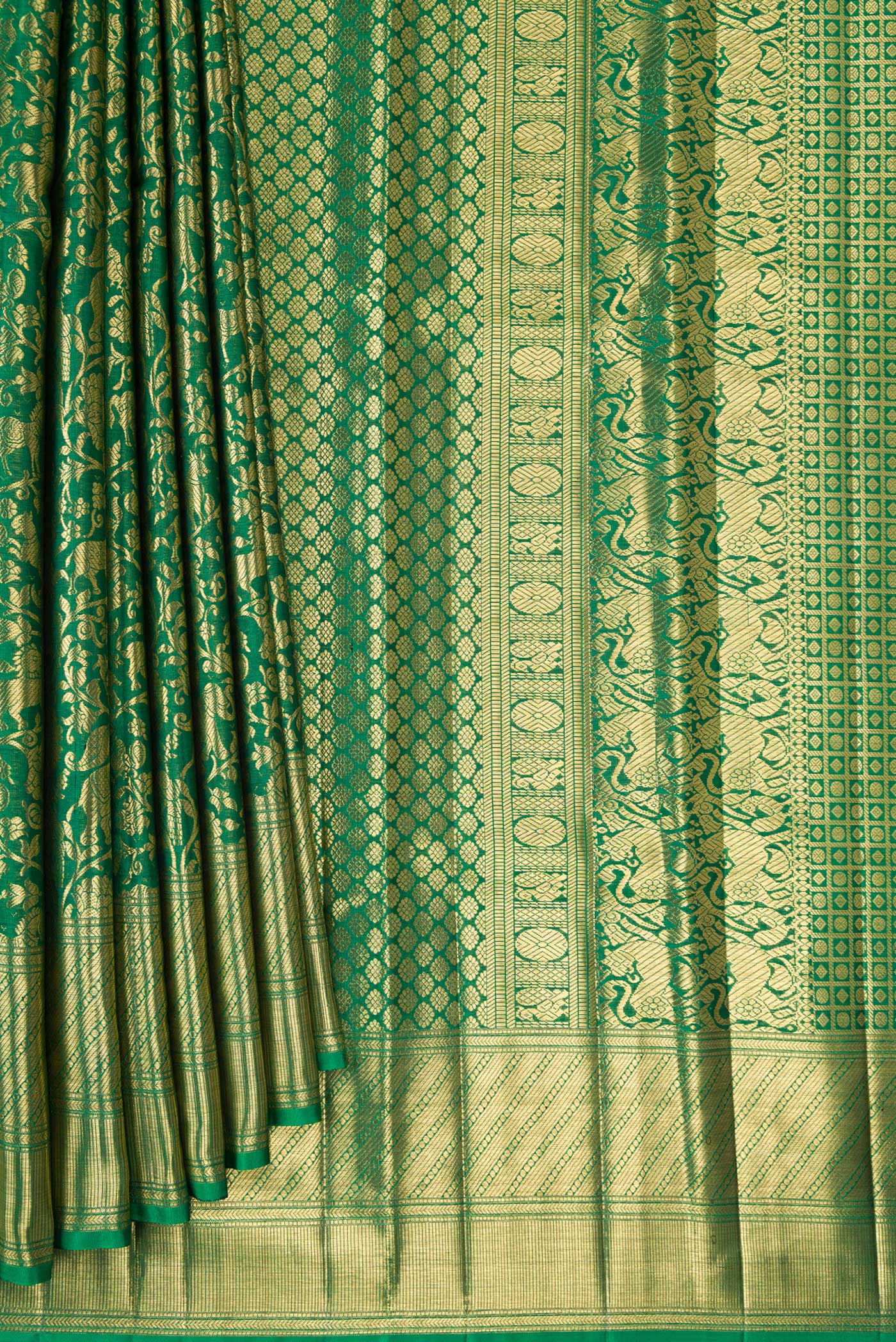 Pleats and pallu of Green Kanjivaram Silk Saree with Zari Brocade on the body and Zari Border. 