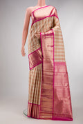 Pure Silk Rose Gold Dual Tone Kanjivaram Tissue Saree with Checked design on the body and Zari Border.  displayed on a mannequin