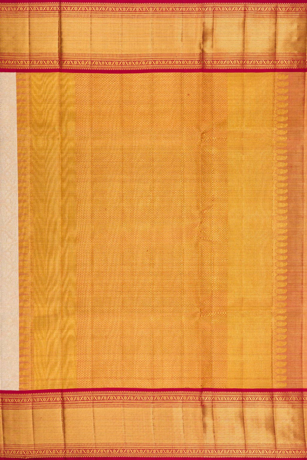 Close up image of the pallu of Golden Peach Kanjivaram Tissue Silk Saree with Zari Brocade on the body and Zari Border. 