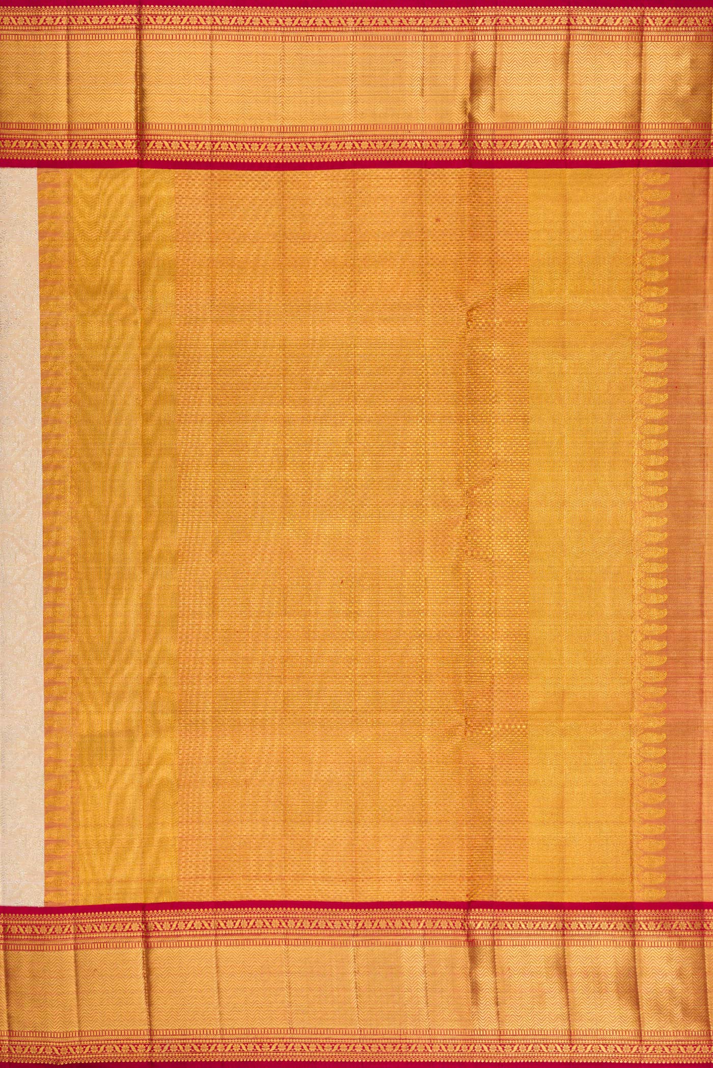 Close up image of the pallu of Golden Peach Kanjivaram Tissue Silk Saree with Zari Brocade on the body and Zari Border. 