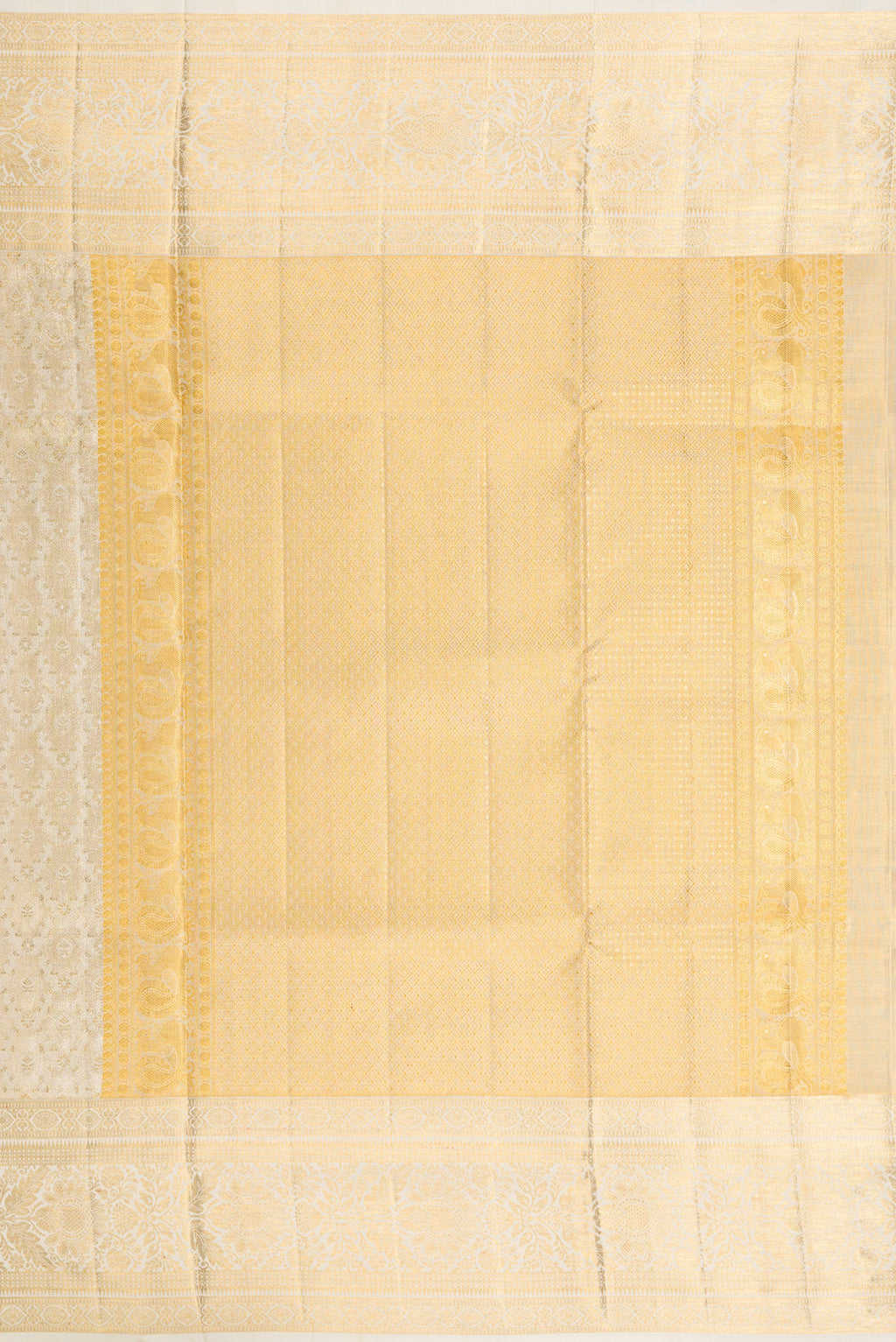 Close up image of the pallu of Off White Dual Tone Kanjivaram Tissue Silk Saree with Zari Brocade on the body and Fancy Border. 