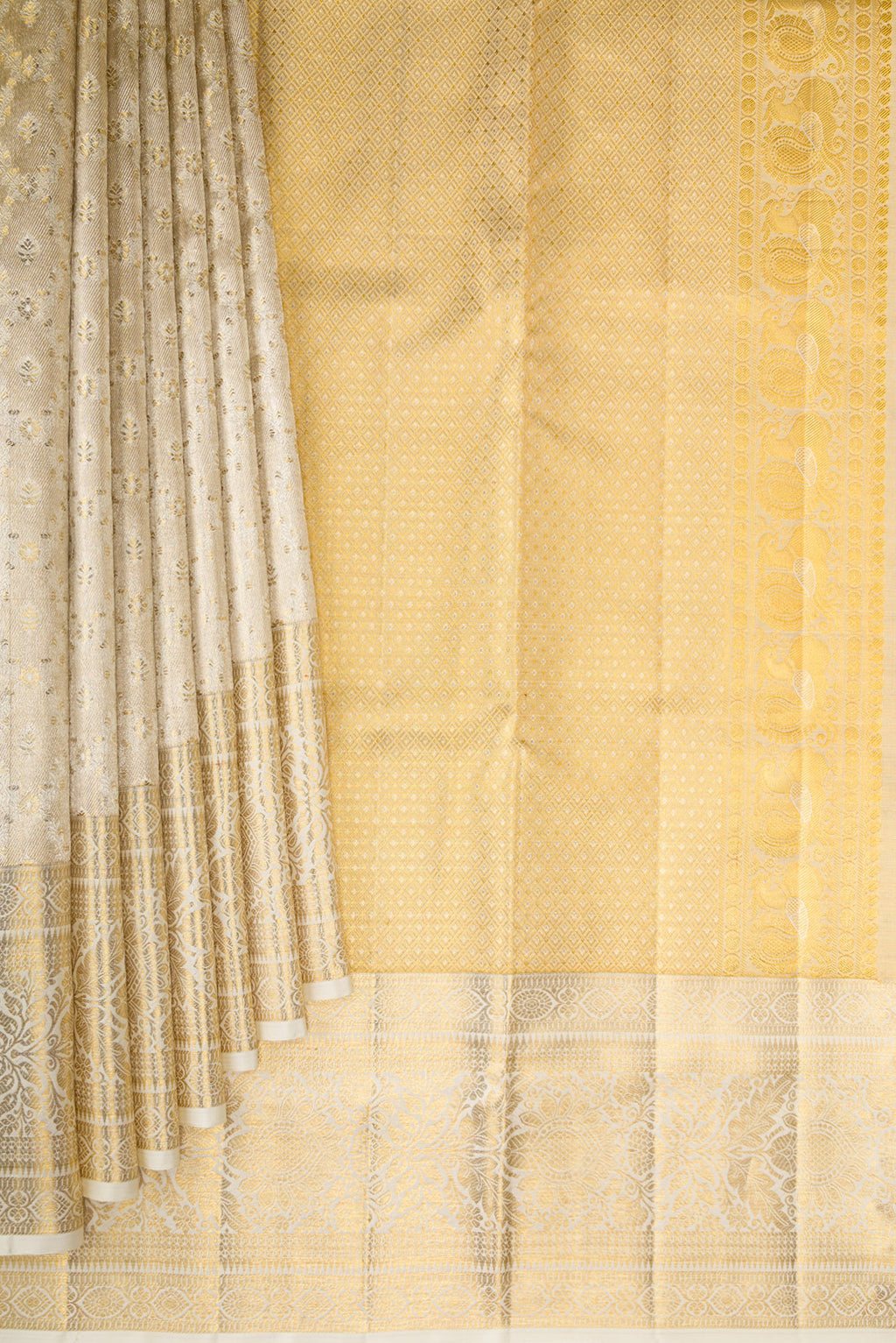 Pleats and pallu of Off White Dual Tone Kanjivaram Tissue Silk Saree with Zari Brocade on the body and Fancy Border. 