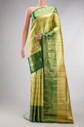 Parrot Green Dual Tone Kanjivaram Tissue Silk Saree with Zari Brocade on the body and Fancy Border.  displayed on a mannequin