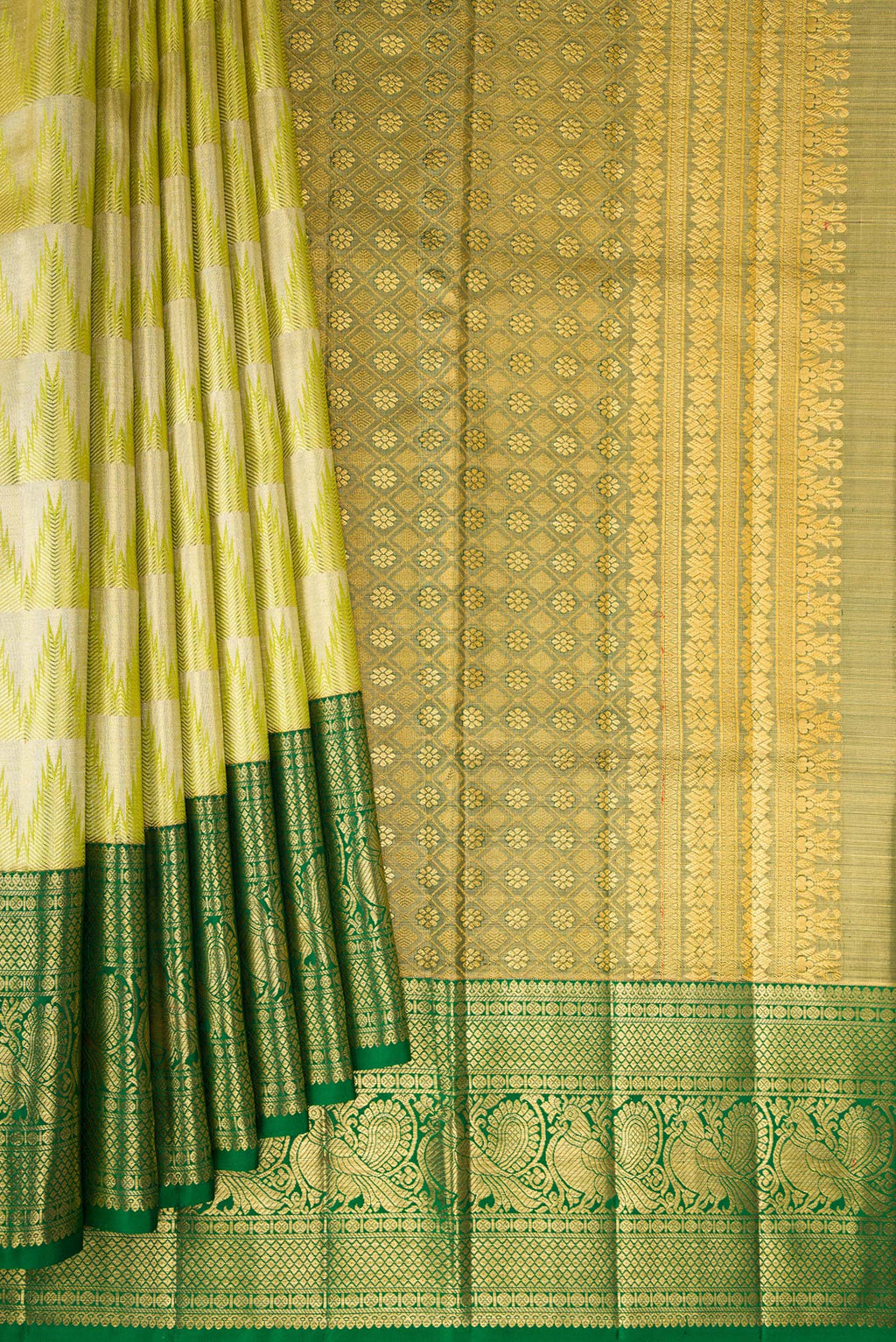 Pleats and pallu of Parrot Green Dual Tone Kanjivaram Tissue Silk Saree with Zari Brocade on the body and Fancy Border. 