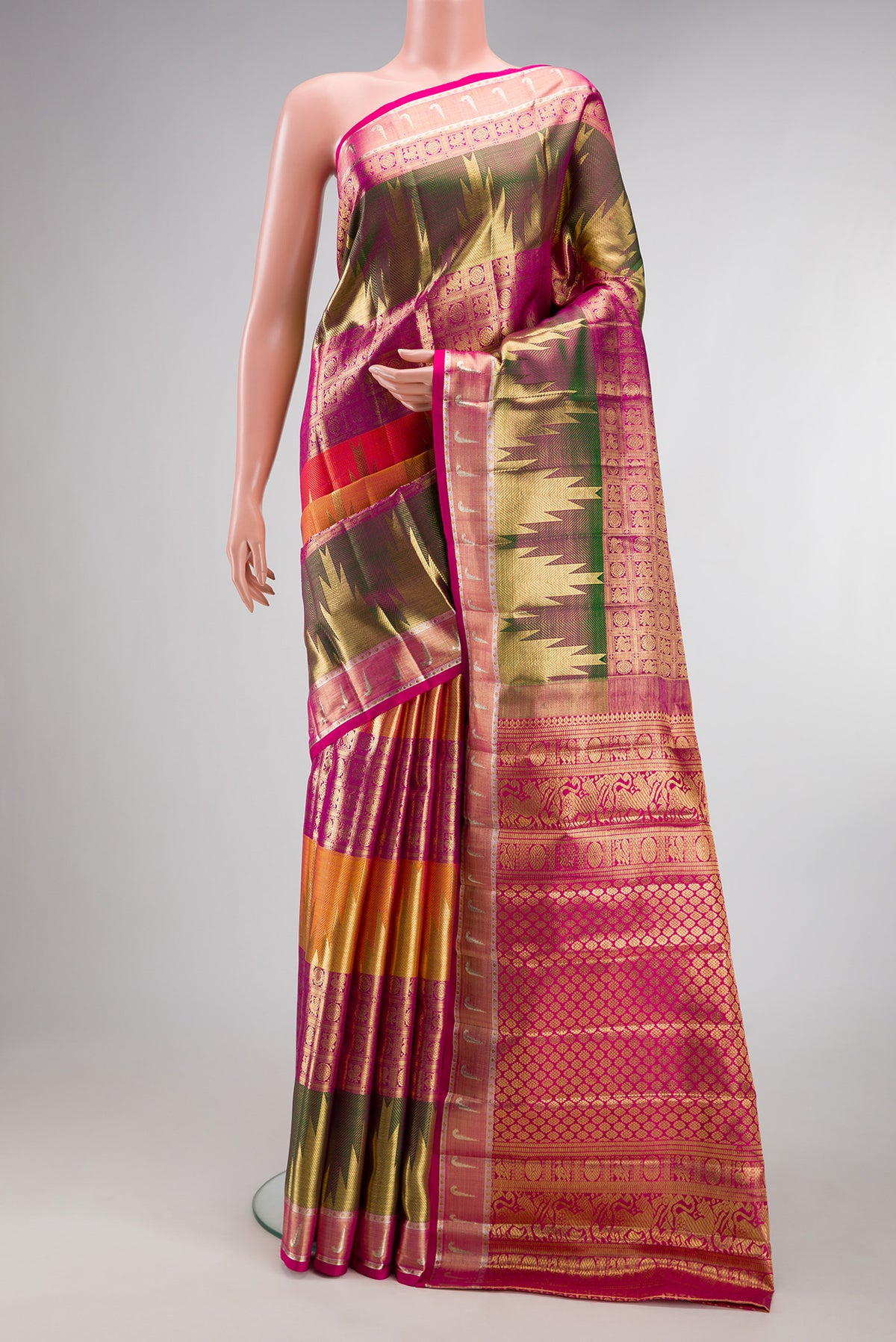 Pure Silk Multi Color Kanjivaram Saree with Zari Brocade on the body and Temple Border.  displayed on a mannequin