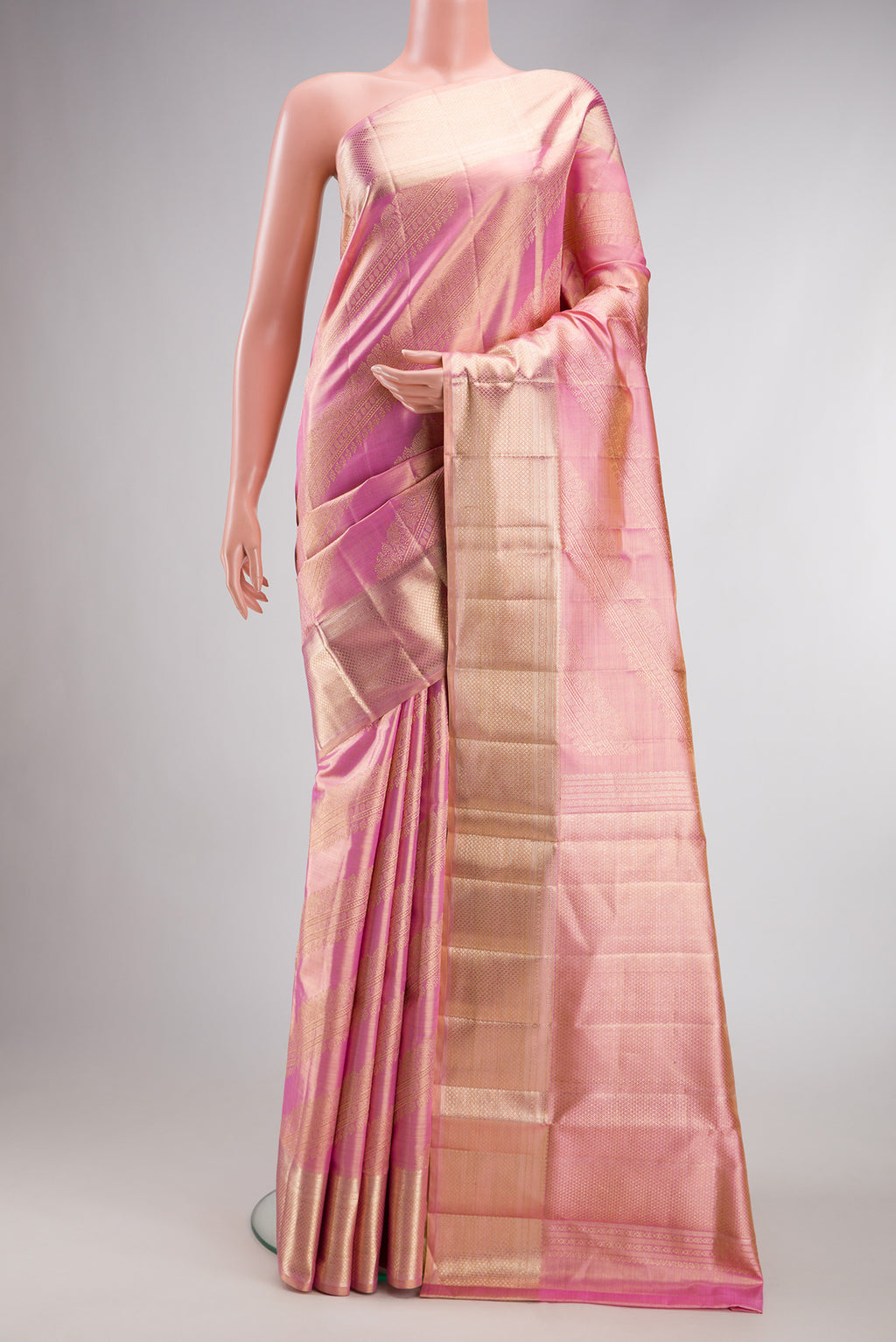 Rose pink Dual Tone Kanjivaram Tissue Silk Saree with Zari Brocade on the body and Zari Border.  displayed on a mannequin