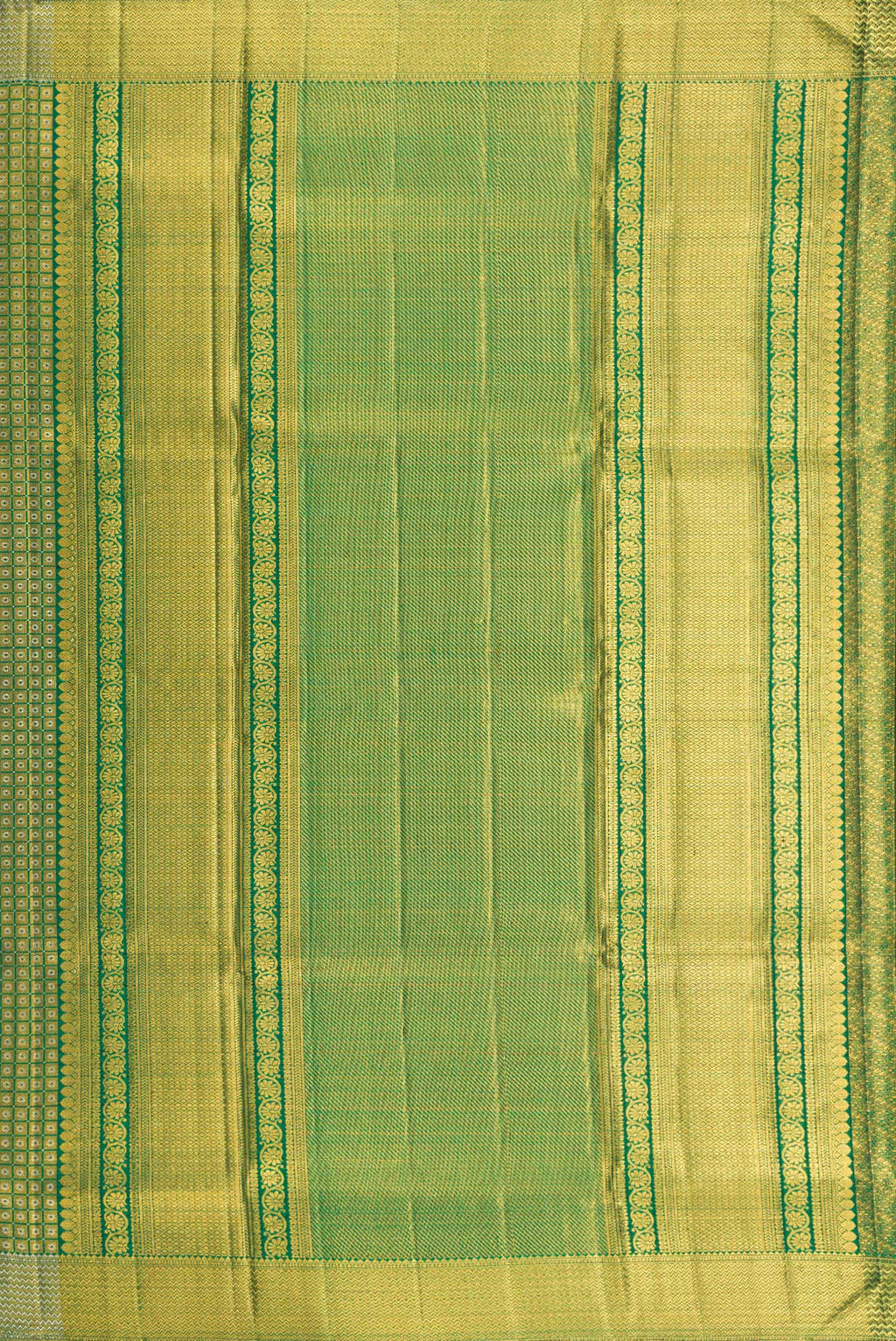 Close up image of the pallu of Green Kanjivaram Silk Saree with Zari Brocade on the body and Zari Border. 