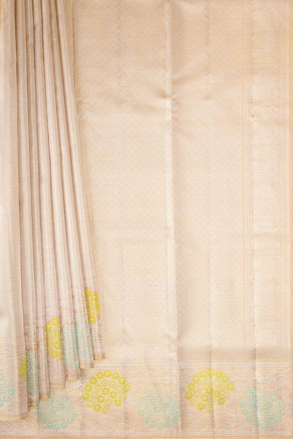 Pleats and pallu of Golden Peach Dual Tone Kanjivaram Tissue Silk Saree with Zari Brocade on the body and Fancy Border. 