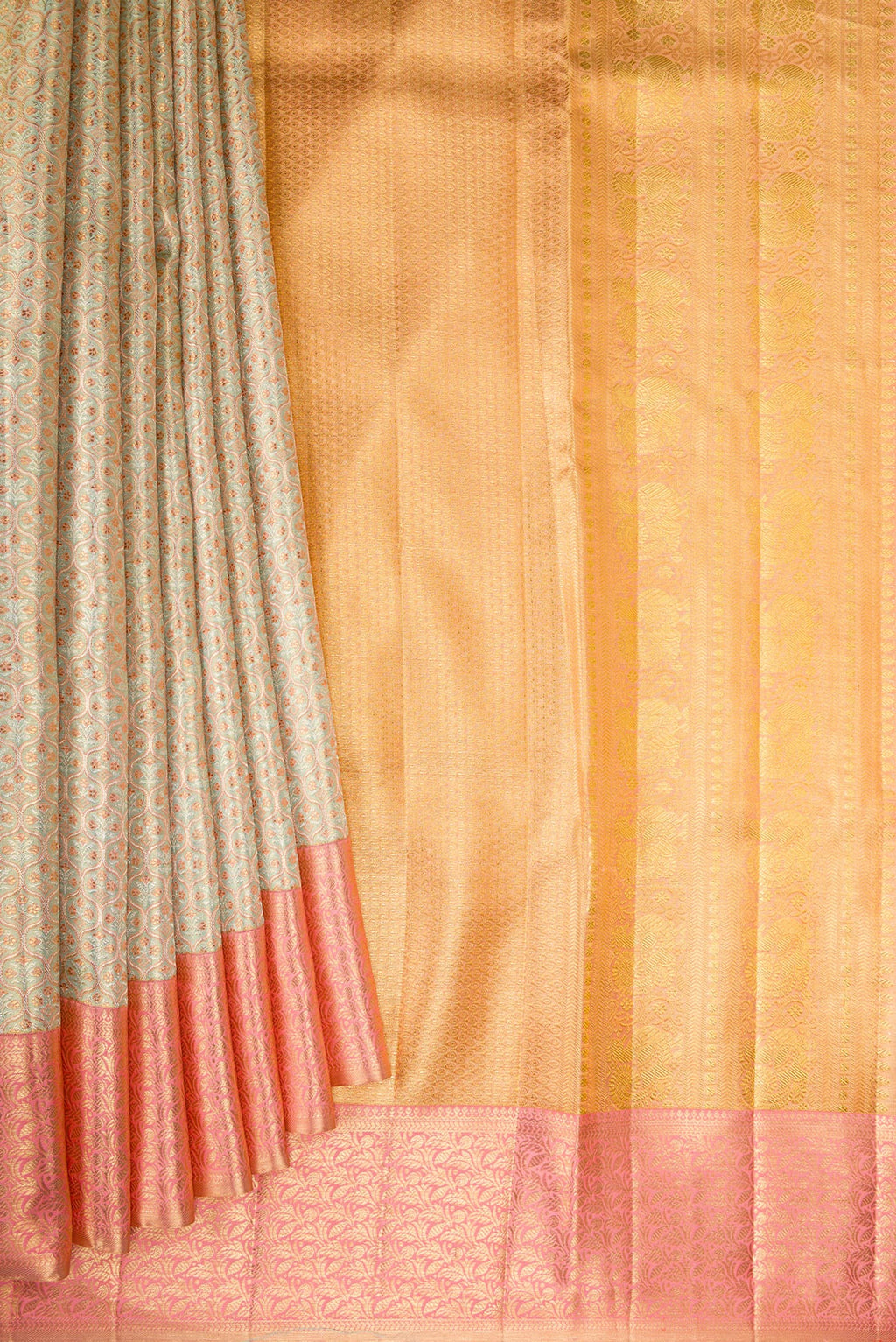 Pleats and pallu of Pista Green Dual Tone Kanjivaram Tissue Silk Saree with Zari Brocade on the body and Fancy Border. 