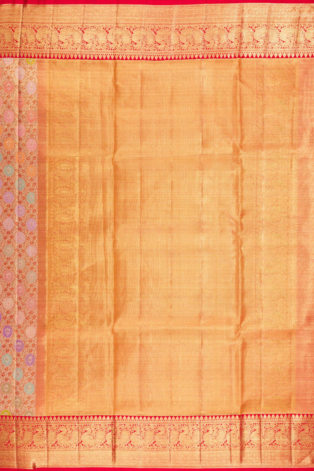 Close up image of the pallu of Pure Silk Golden Peach Dual Tone Kanjivaram Tissue Saree with Zari Brocade on the body and Zari Border. 