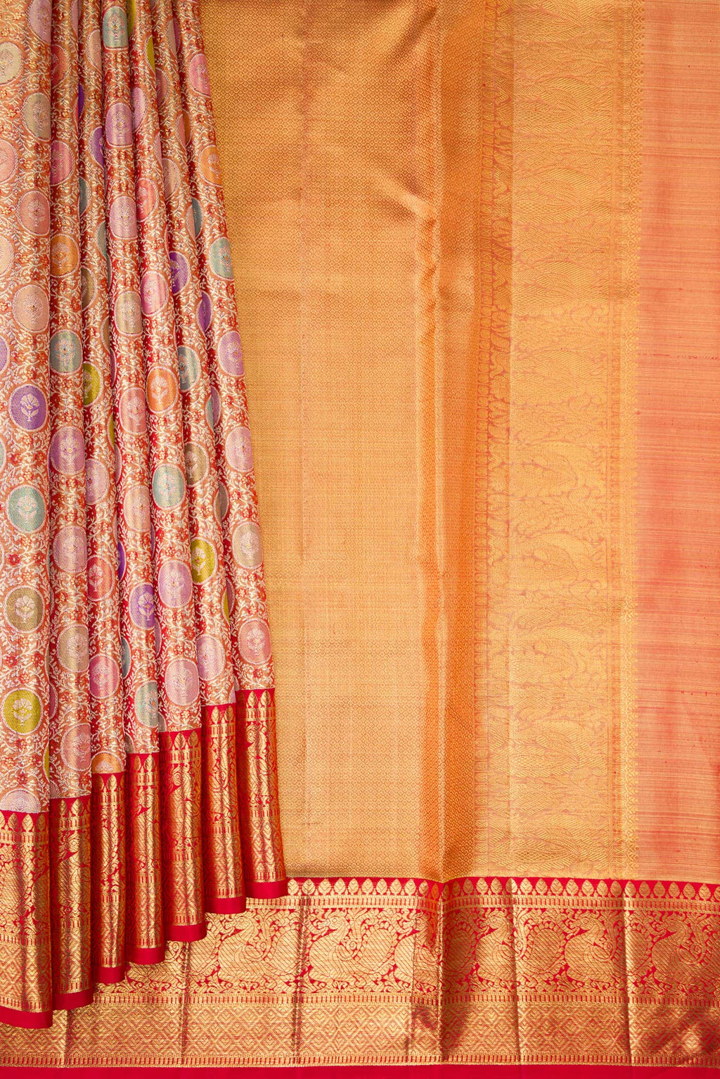 Pleats and pallu of Pure Silk Golden Peach Dual Tone Kanjivaram Tissue Saree with Zari Brocade on the body and Zari Border. 