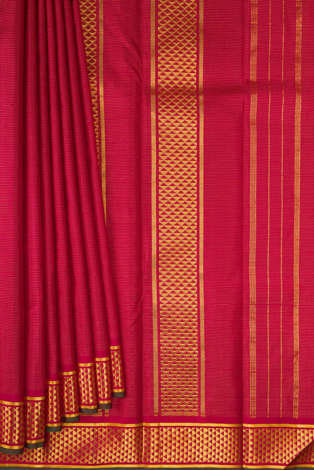 Pleats and pallu of Pure Silk Maroon Kanchipuram Saree with Stripes on the body and Zari Border. 