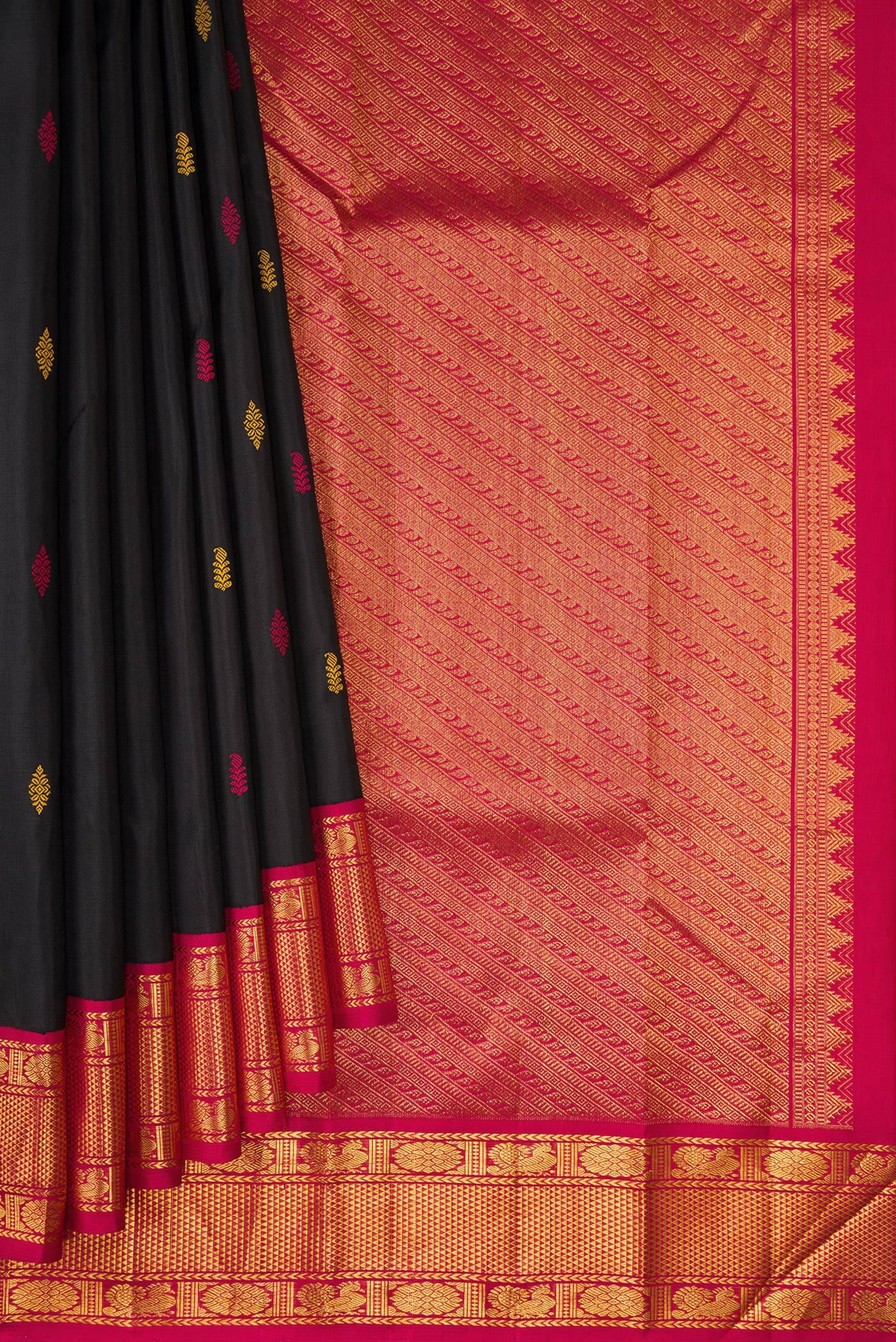 Pleats and pallu of Black Kanjivaram Silk Saree with Thread Butta on the body and Ganga Jamuna Border. 