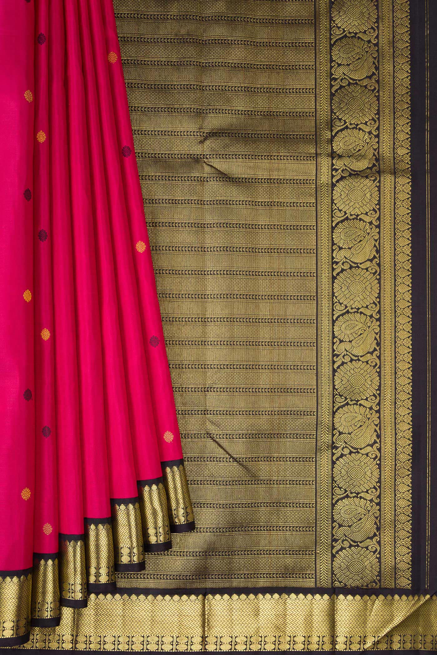 Pleats and pallu of Dark Pink Kanjivaram Silk Saree with Zari And Thread Butta on the body and Zari Border. 