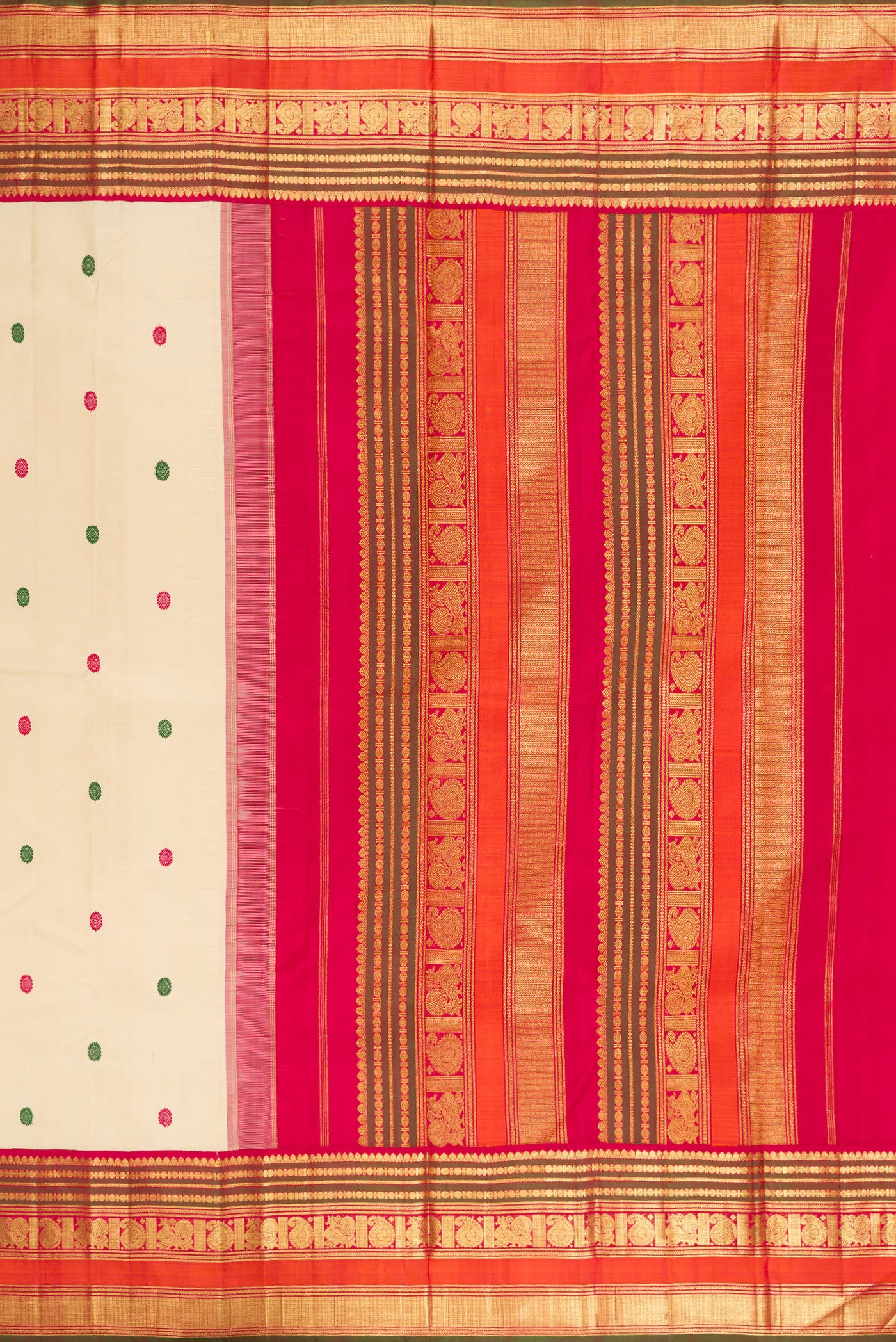 Close up image of the pallu of Beige Kanjivaram Silk Saree with Thread Butta on the body and Zari Border. 