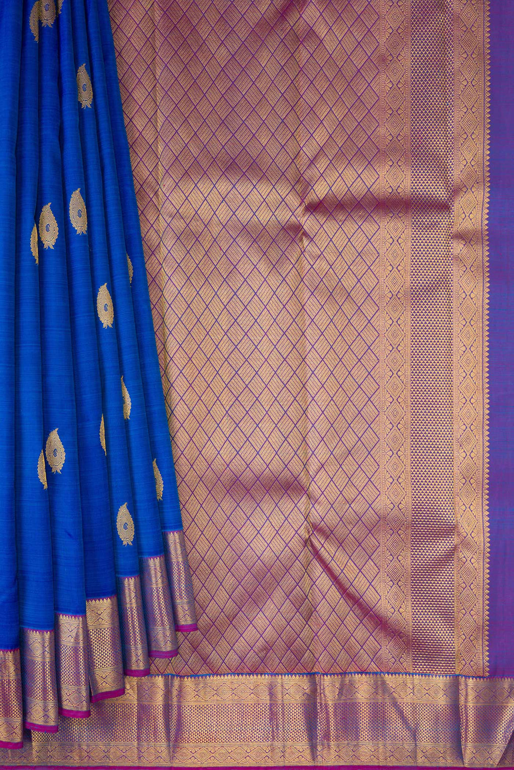 Pleats and pallu of Royal Blue Kanjivaram Silk Saree with Zari Butta on the body and Zari Border. 