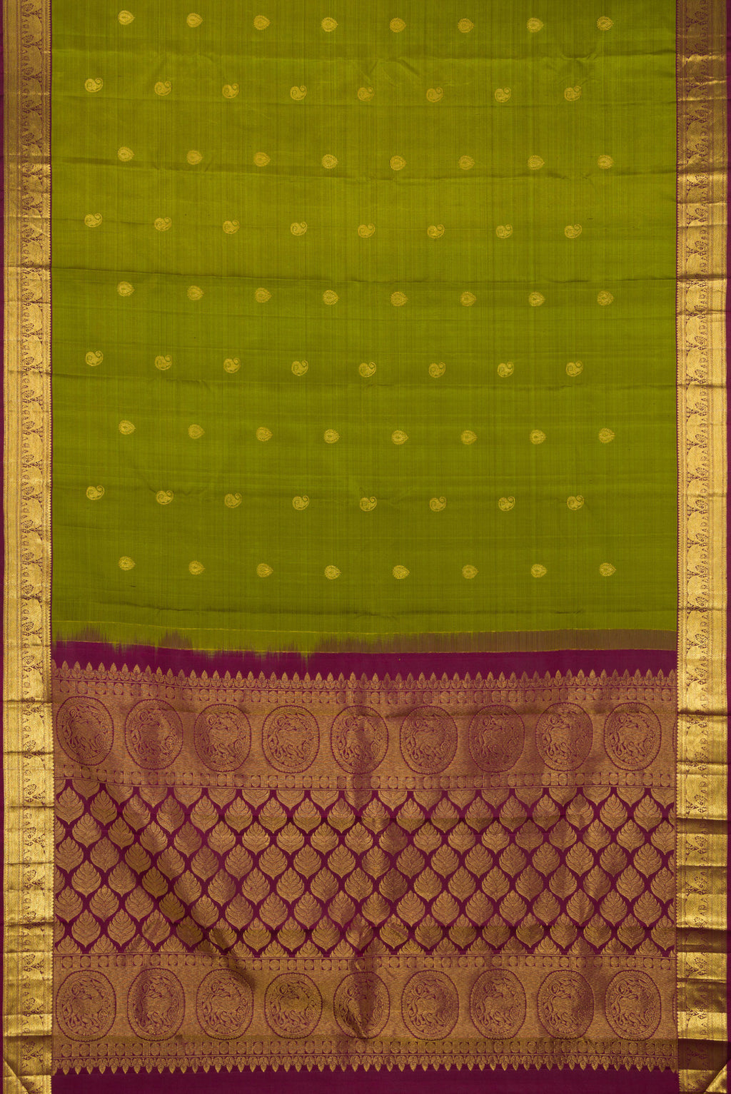 Flat view of Mehandi Green Kanchipuram Silk Saree with Zari Butta on the body and Zari Border. 