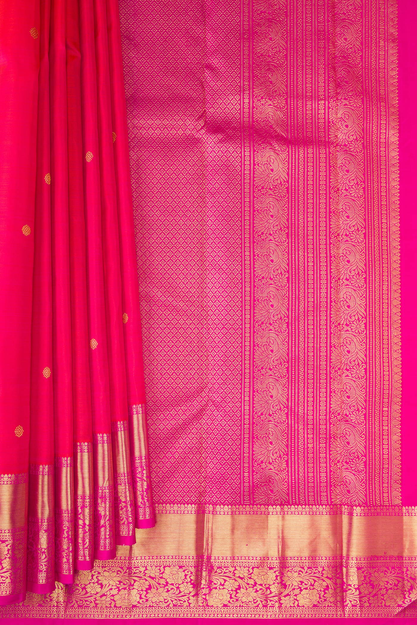 Pleats and pallu of Pink Kanjivaram Silk Saree with Zari Butta on the body and Zari Border. 
