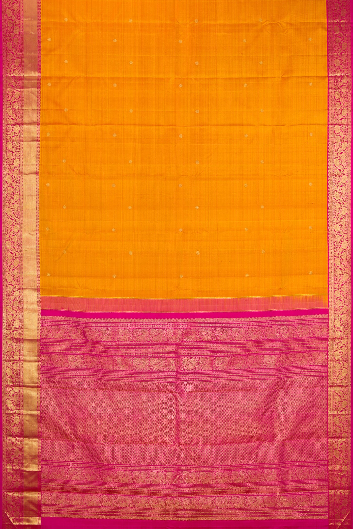 Flat view of Mustard Kanjivaram Silk Saree with Zari Butta on the body and Zari Border. 
