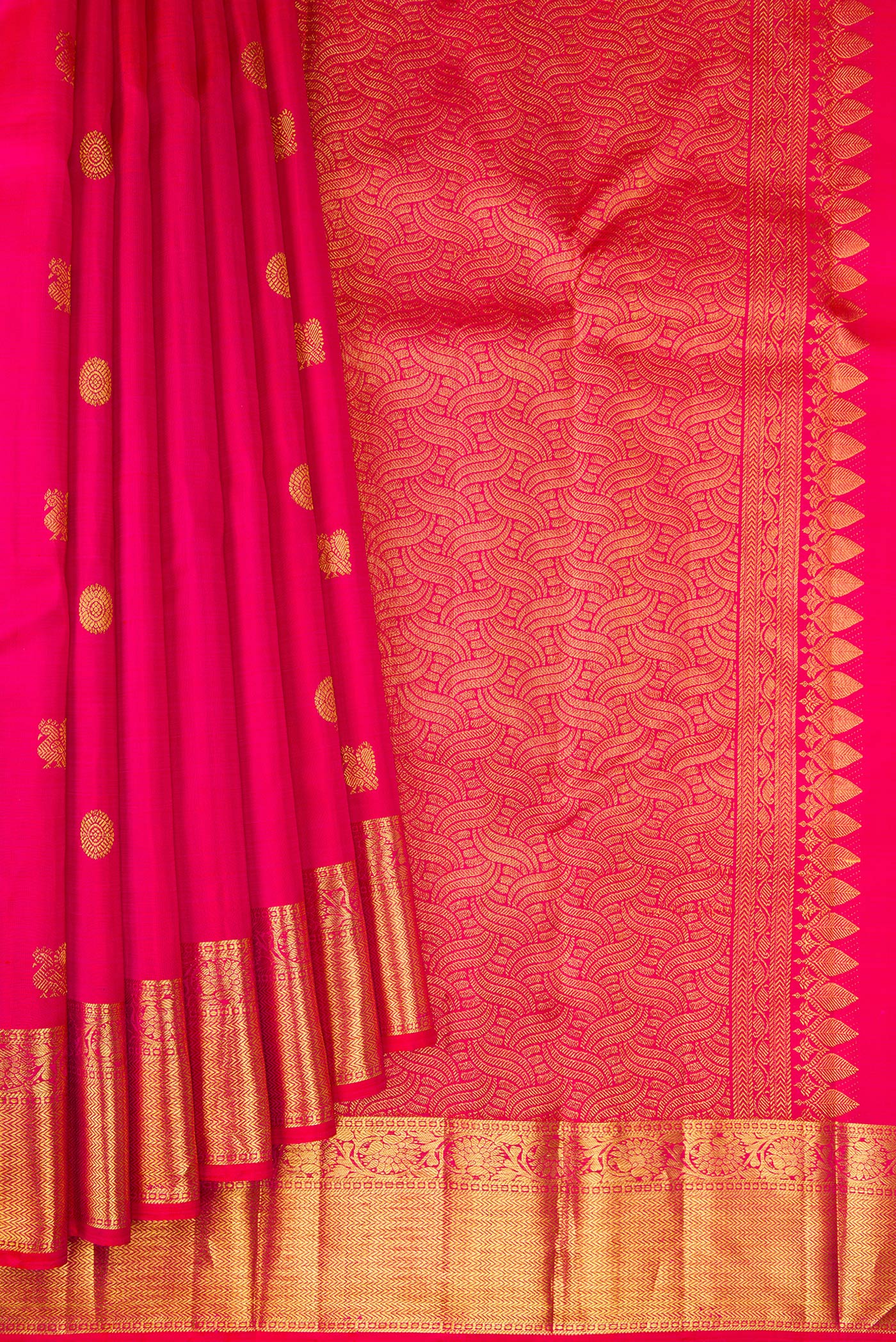 Pleats and pallu of Dark Pink Kanjivaram Silk Saree with Zari Butta on the body and Zari Border. 