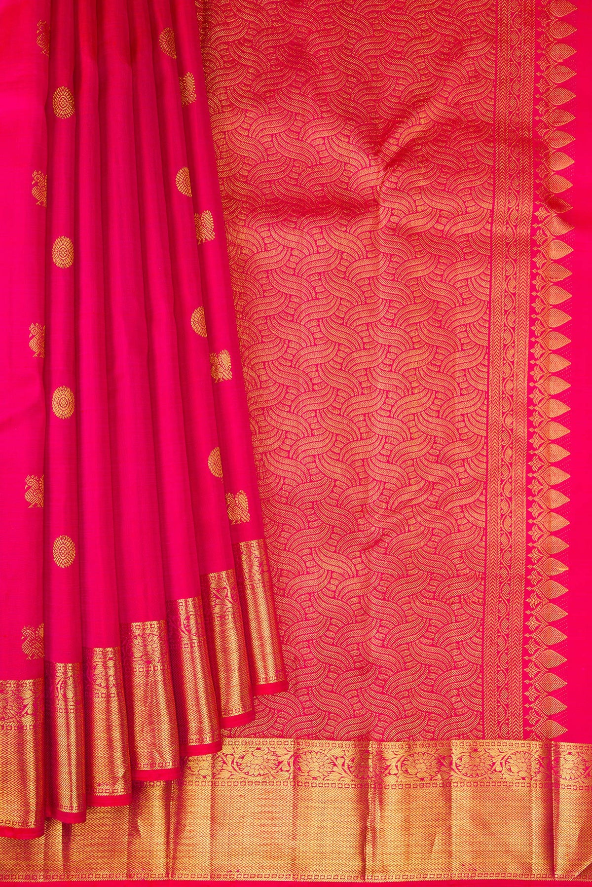 Pleats and pallu of Dark Pink Kanjivaram Silk Saree with Zari Butta on the body and Zari Border. 