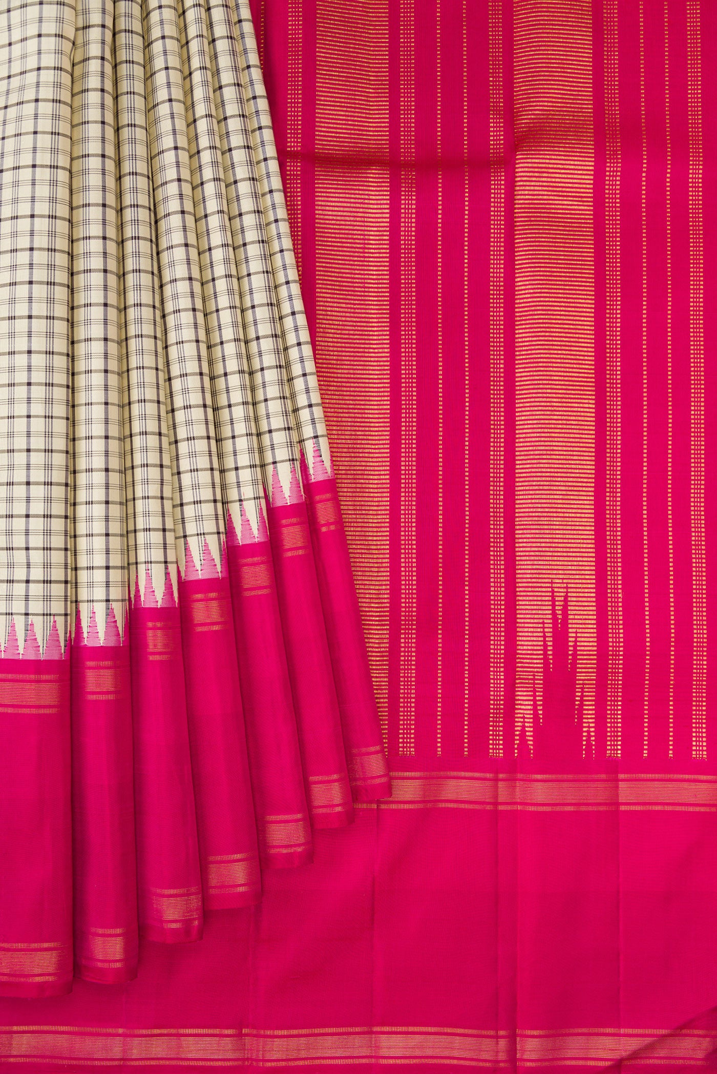 Pleats and pallu of Beige Kanjivaram Silk Saree with Checked design on the body and Zari Border. 