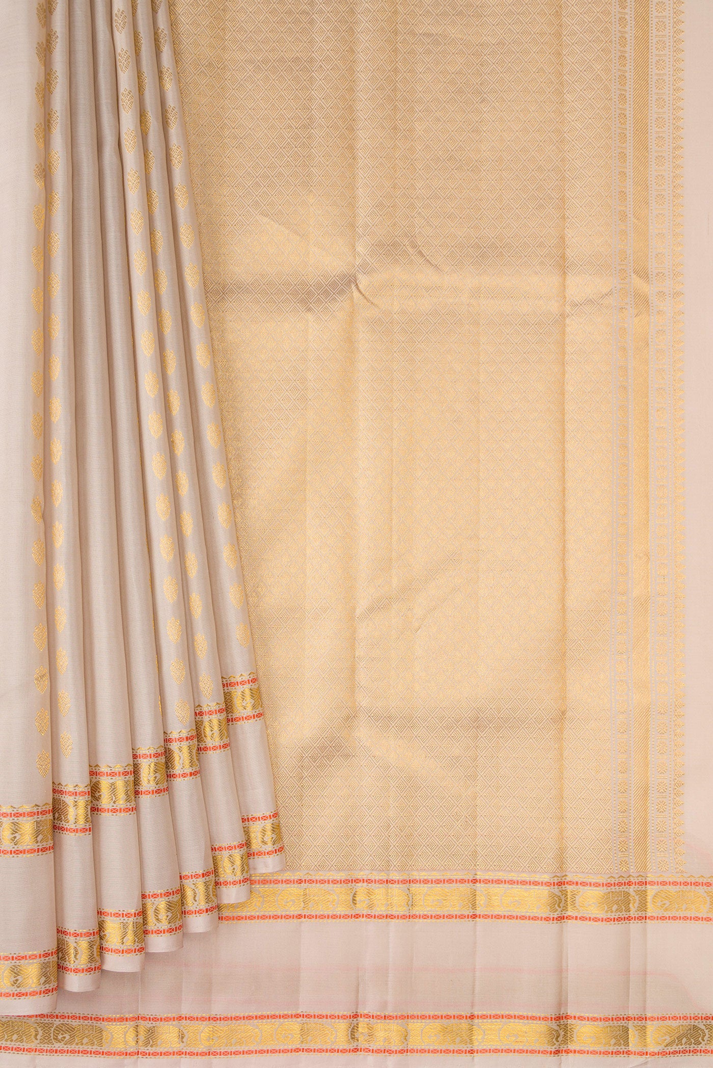 Pleats and pallu of Dark Beige Kanjivaram Silk Saree with Zari Butta on the body and Zari And Thread Border. 