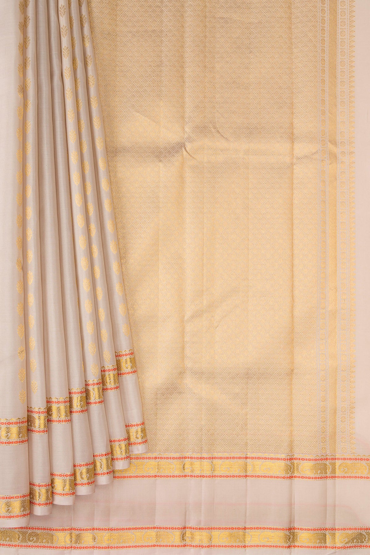 Pleats and pallu of Dark Beige Kanjivaram Silk Saree with Zari Butta on the body and Zari And Thread Border. 