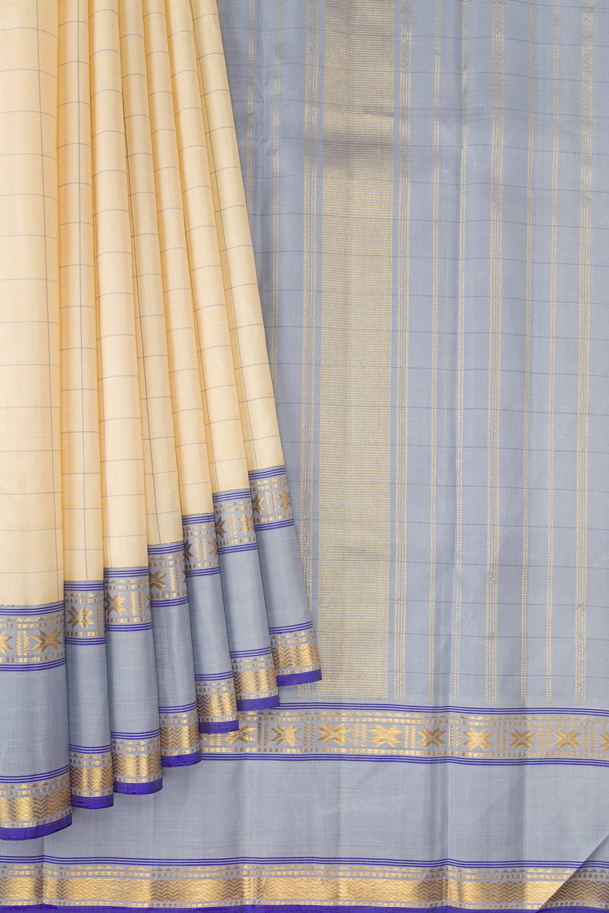 Pleats and pallu of Sandal Kanjivaram Silk Saree with Checked design on the body and Zari Border. 