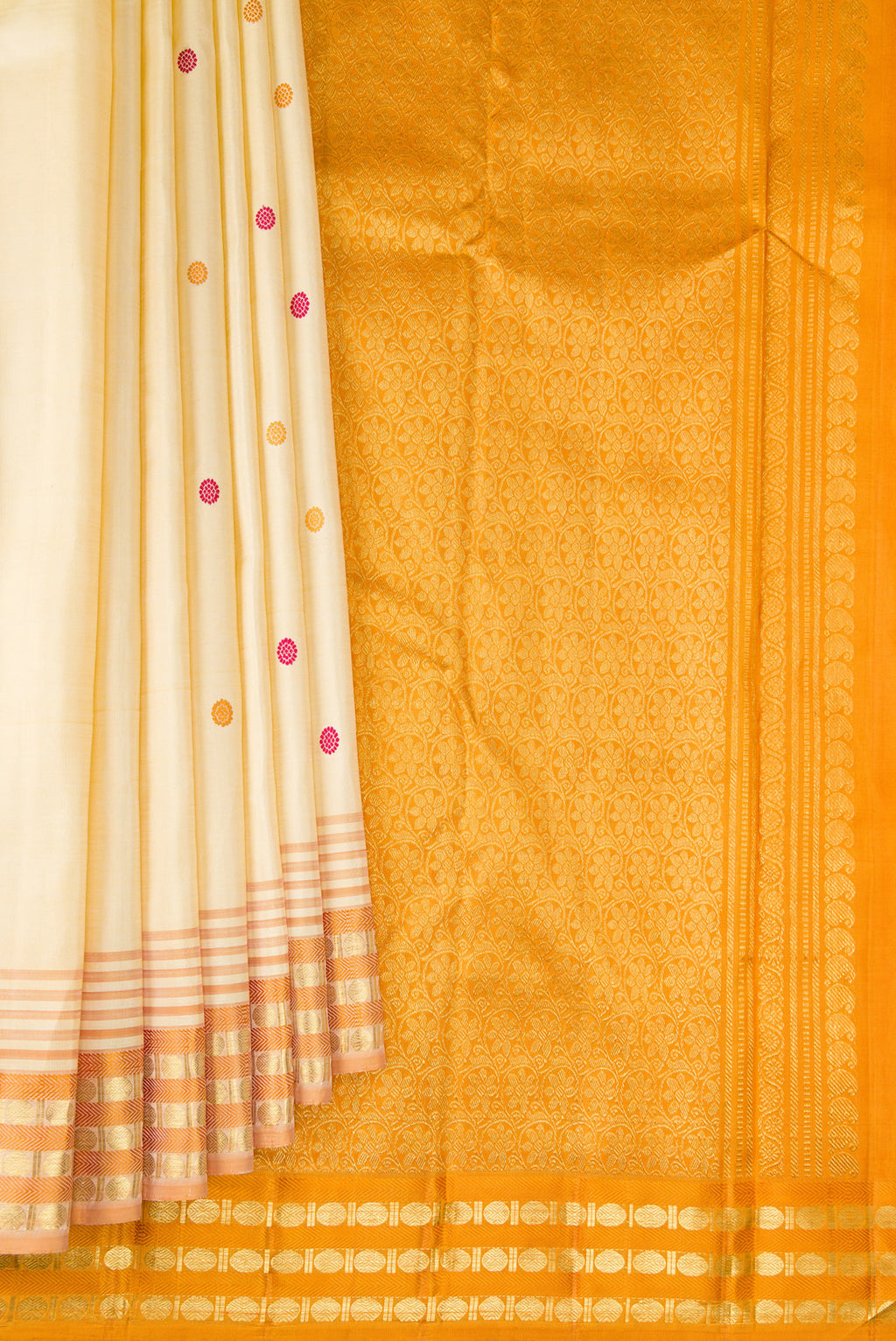 Pleats and pallu of Sandal Kanjivaram Silk Saree with Zari And Thread Butta on the body and Zari Border. 