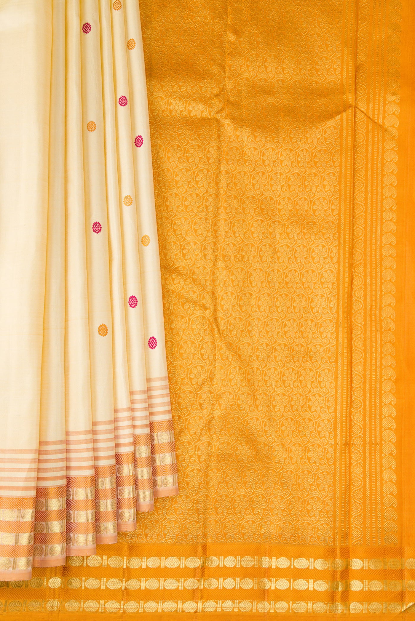 Pleats and pallu of Sandal Kanjivaram Silk Saree with Zari And Thread Butta on the body and Zari Border. 