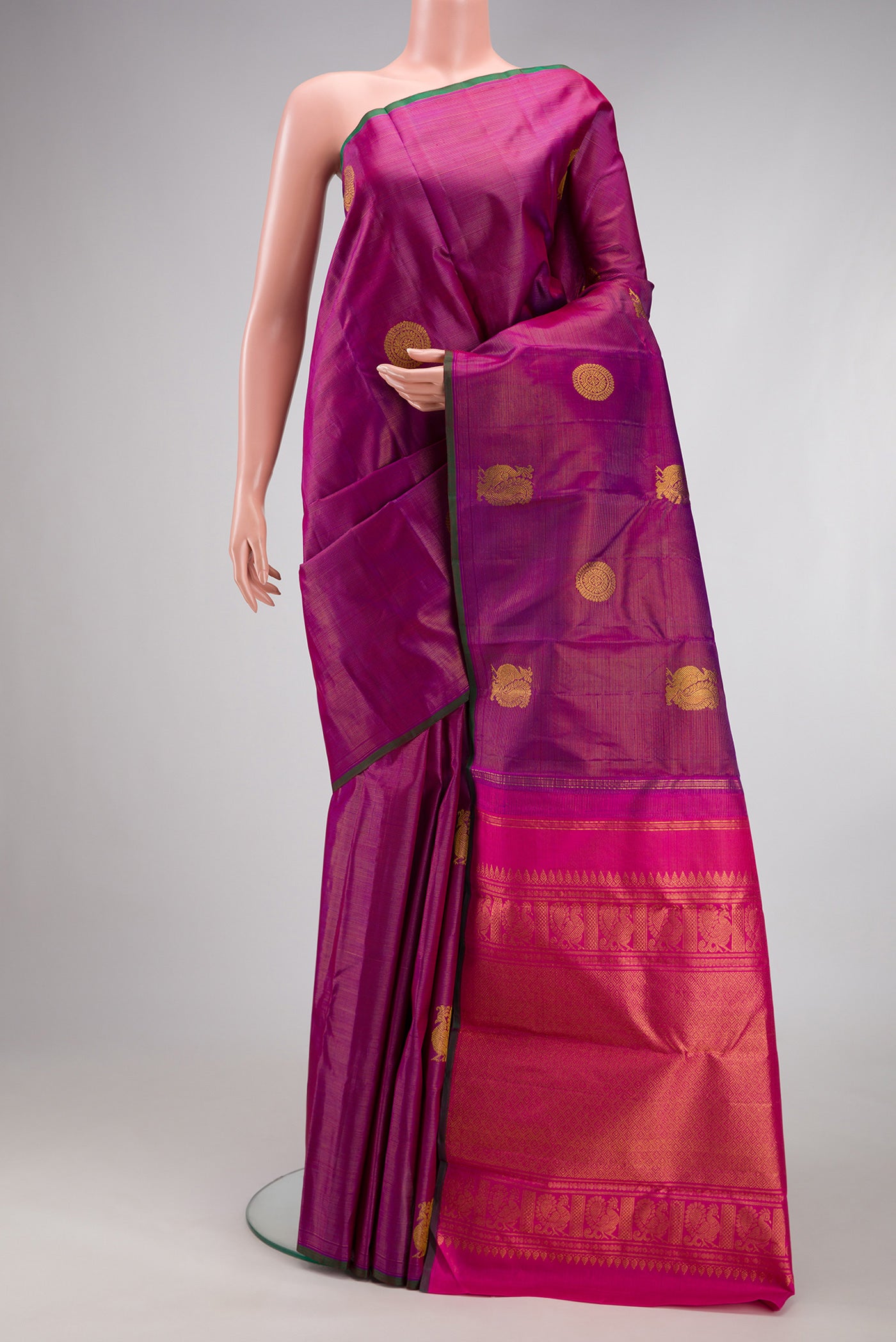 Purple Kanchipuram Silk Saree with Stripes on the body and Without Border.  displayed on a mannequin