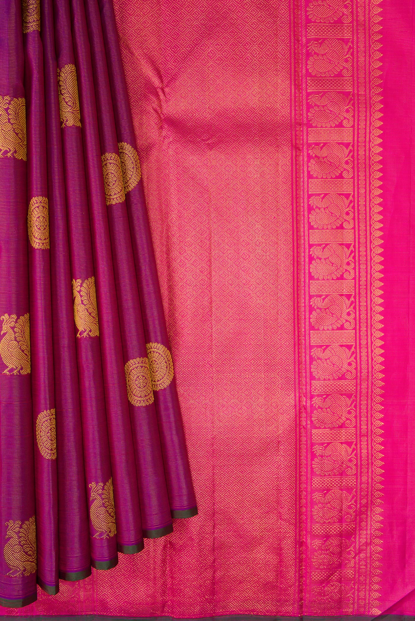 Pleats and pallu of Purple Kanchipuram Silk Saree with Stripes on the body and Without Border. 