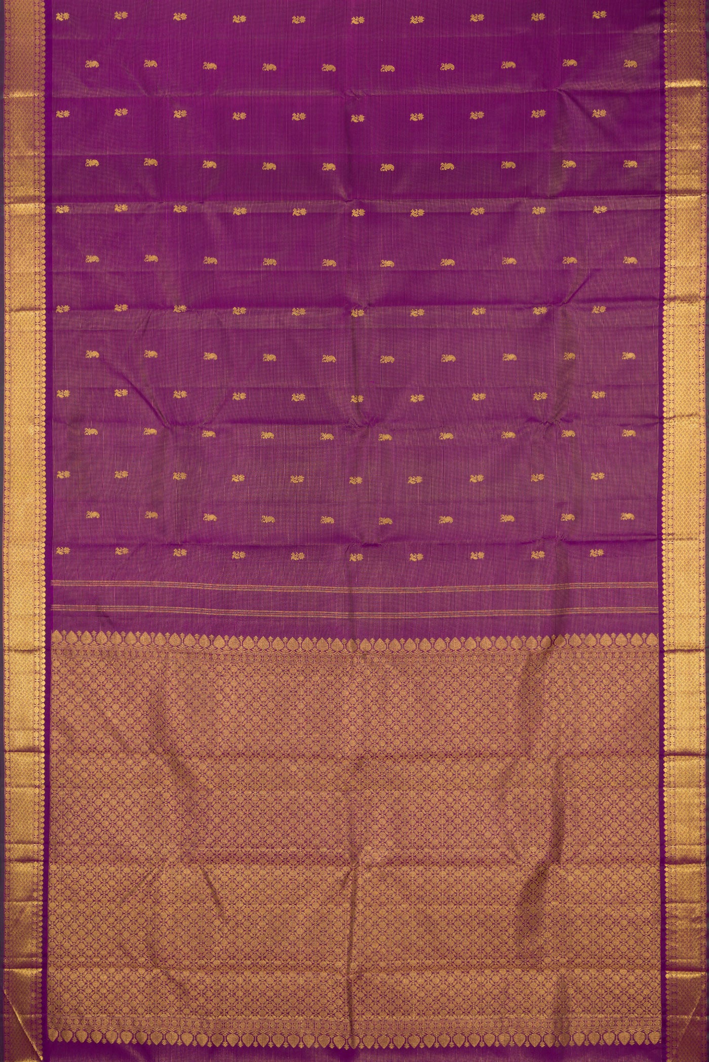 Flat view of Purple Kanjivaram Silk Saree with Zari Butta on the body and Zari Border. 