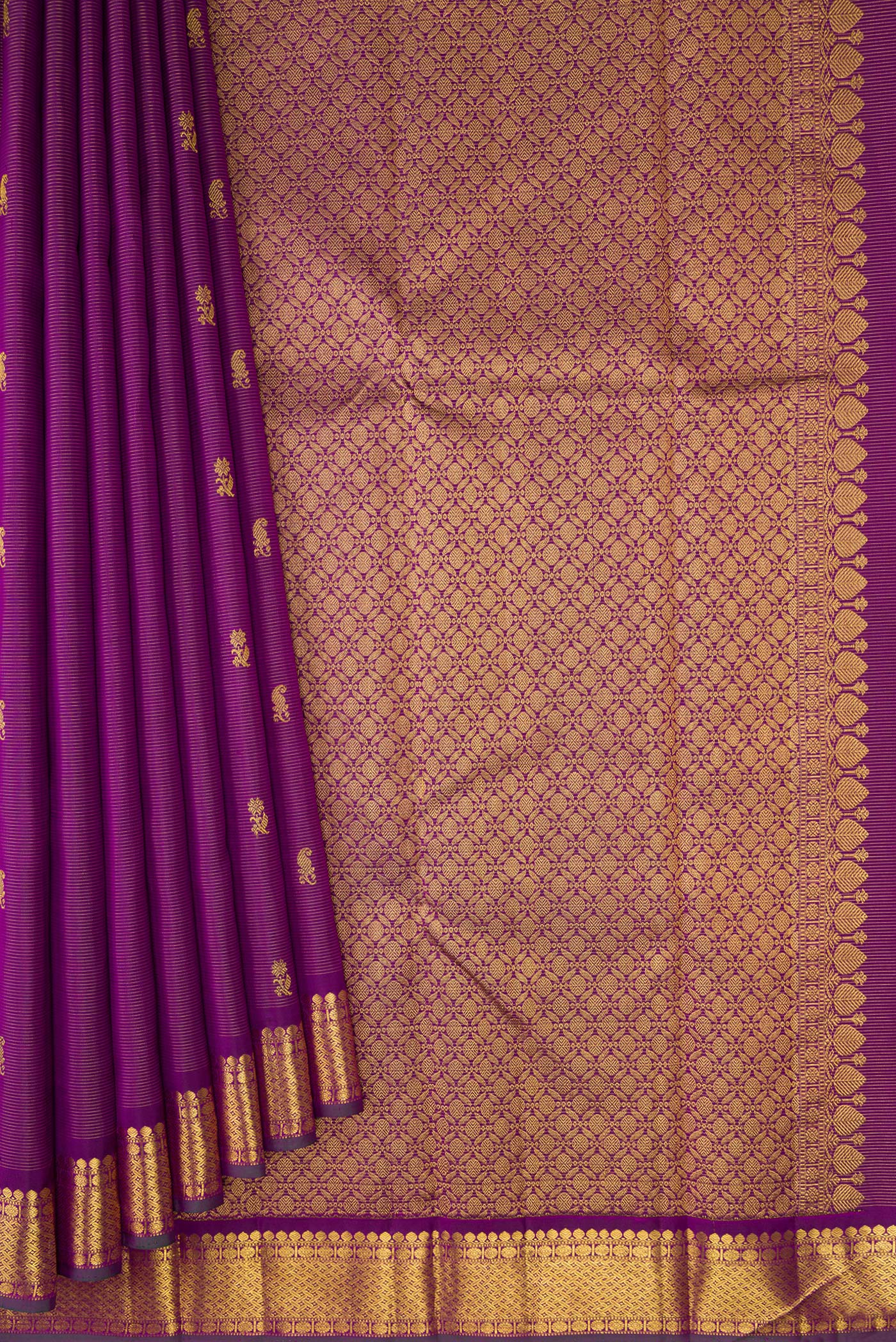 Pleats and pallu of Purple Kanjivaram Silk Saree with Zari Butta on the body and Zari Border. 