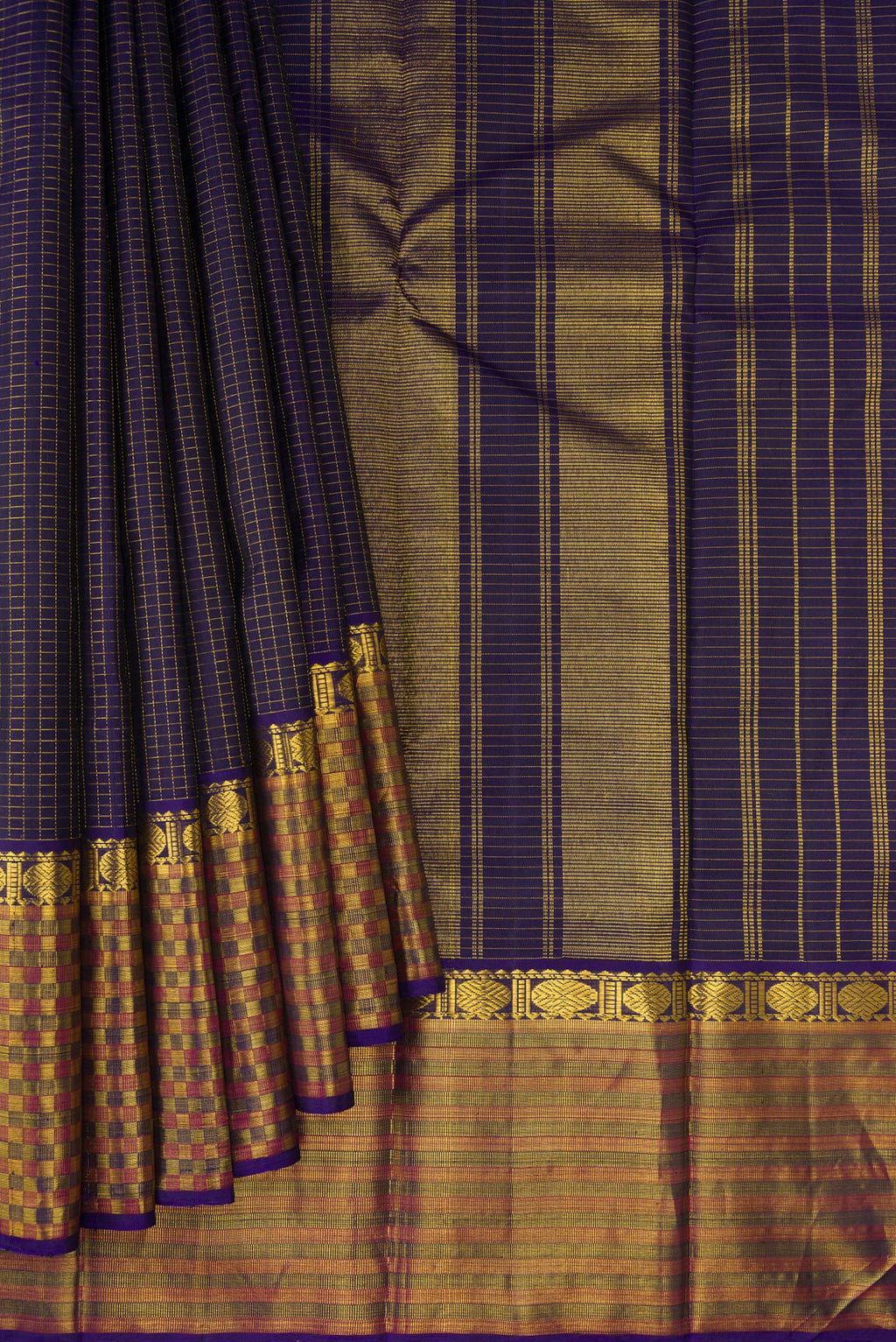Pleats and pallu of Navy Blue Kanjivaram Silk Saree with Checked design on the body and Fancy Border. 