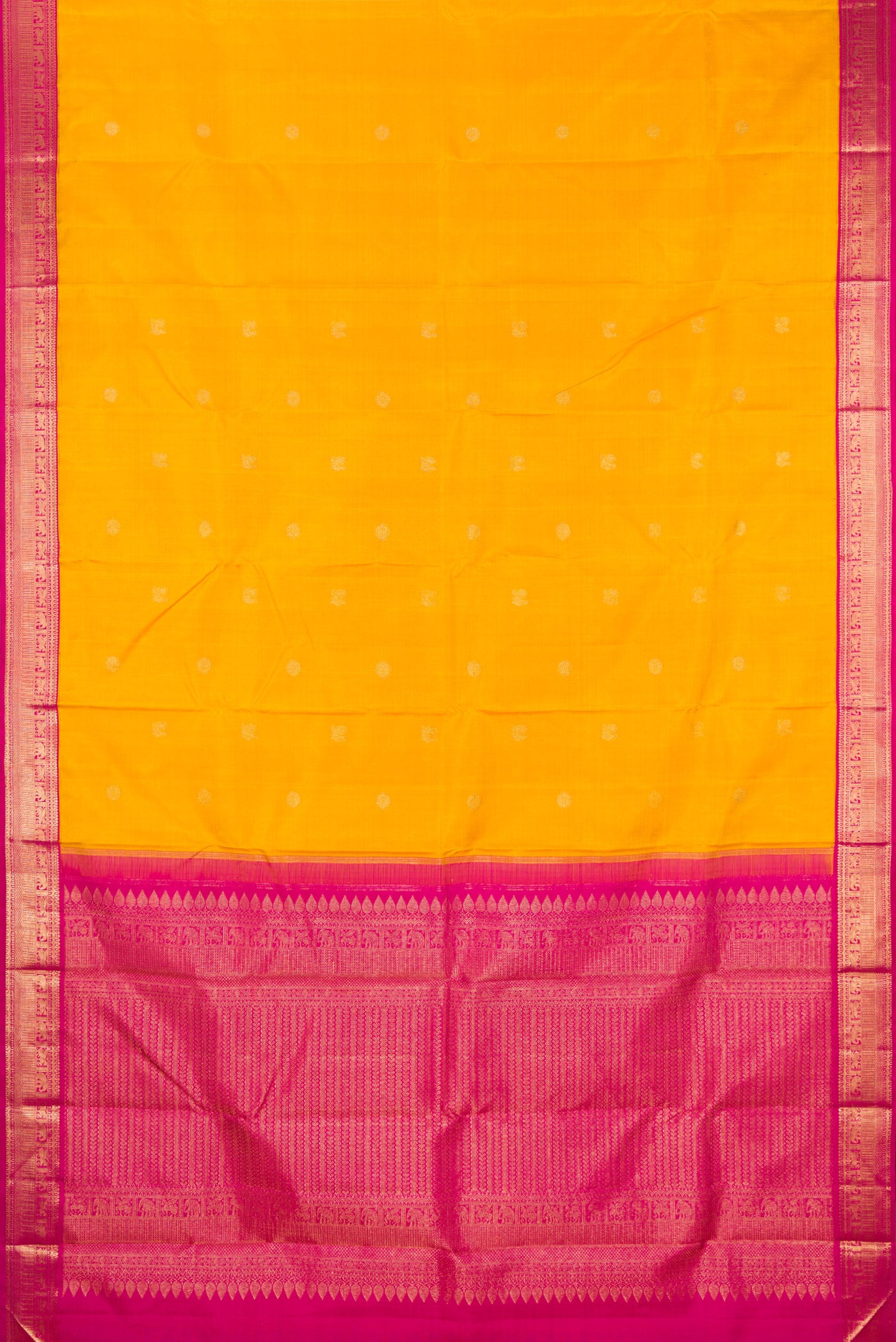 Flat view of Yellow Kanjivaram Silk Saree with Zari Butta on the body and Zari Border. 