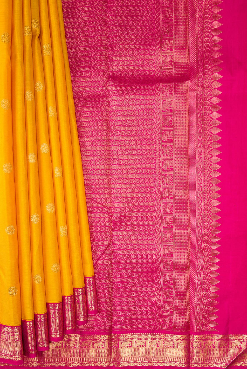 Pleats and pallu of Yellow Kanjivaram Silk Saree with Zari Butta on the body and Zari Border. 