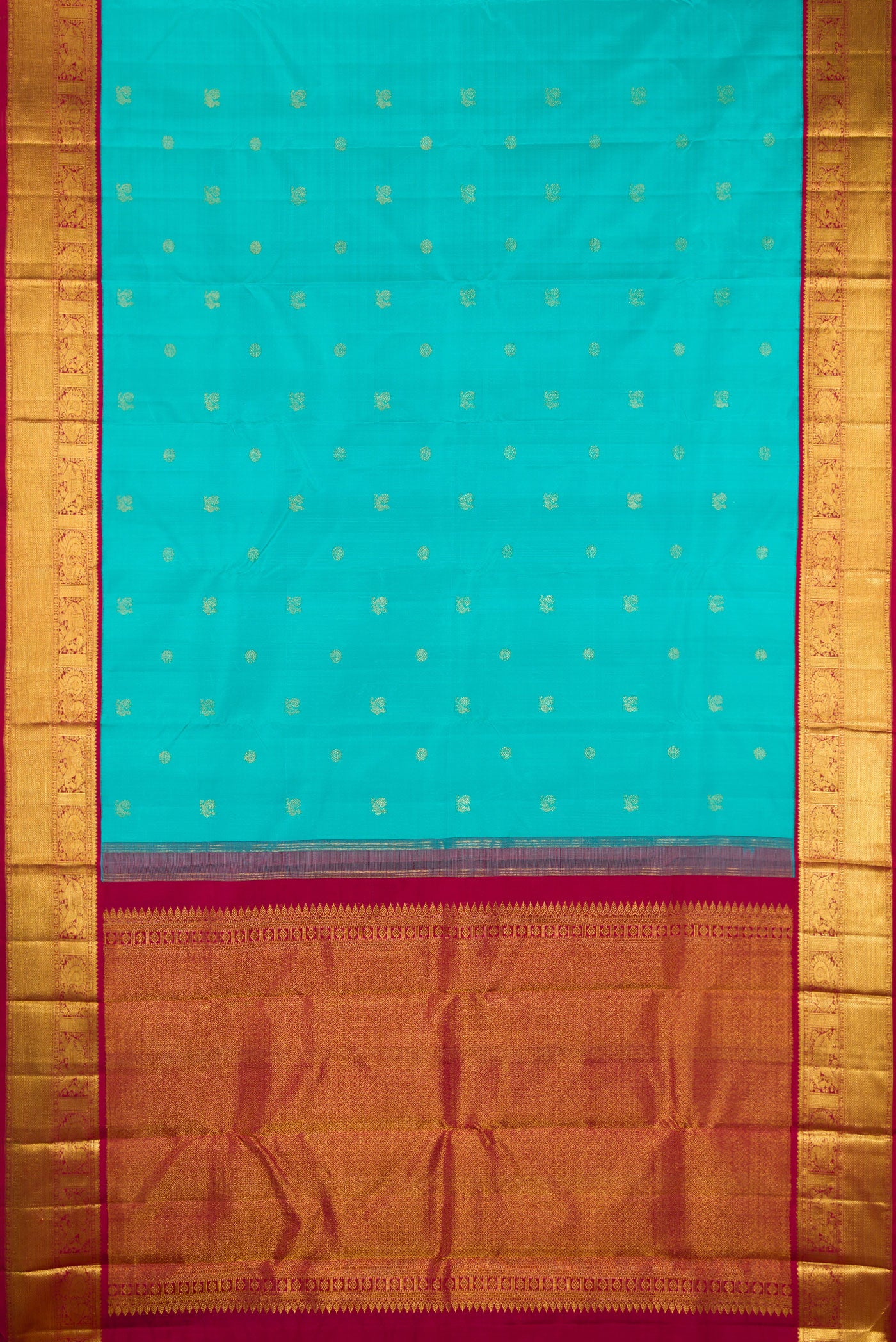 Flat view of Pure Silk Sky Blue Kanjivaram Saree with Zari Butta on the body and Zari Border. 