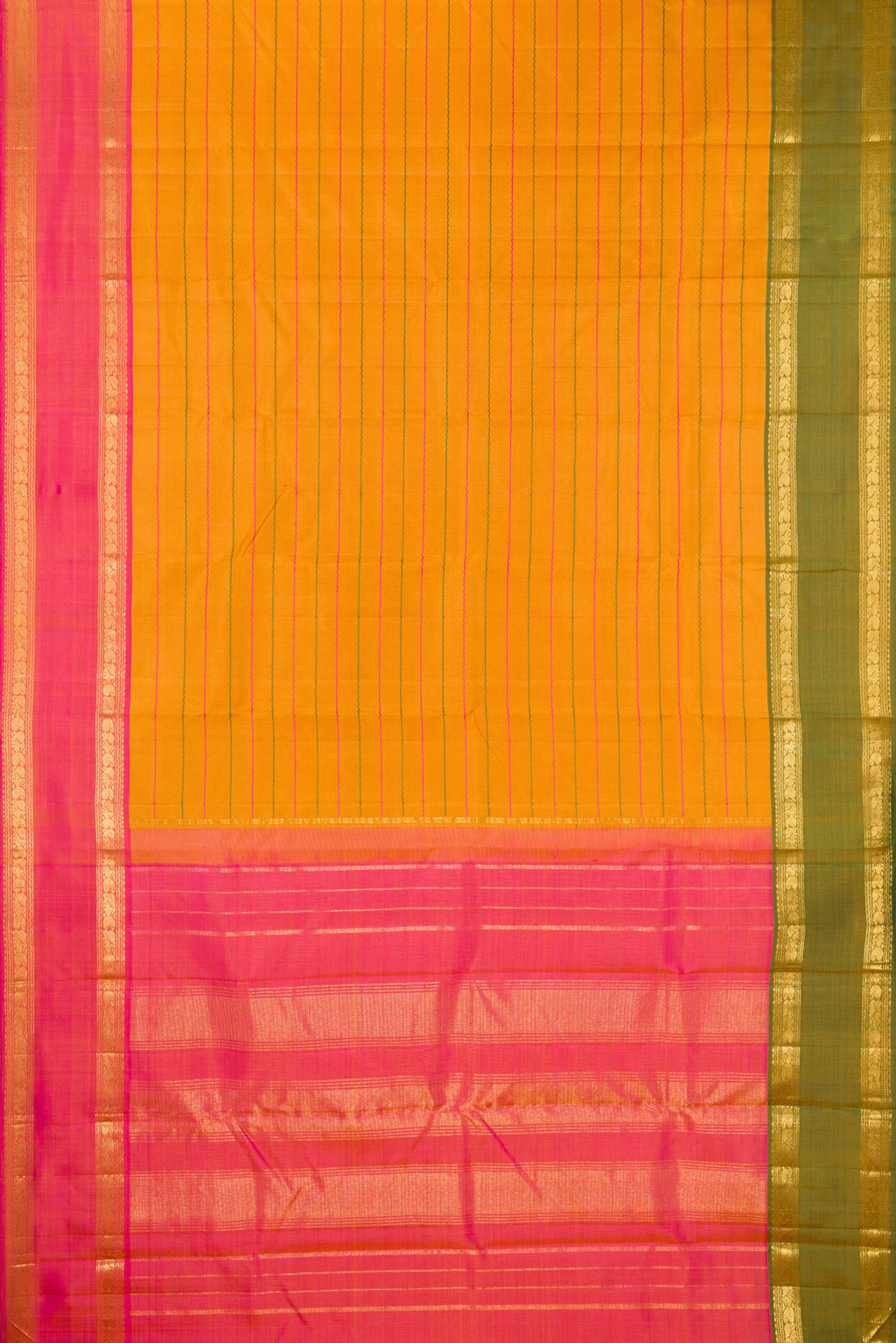 Flat view of Mustard Kanchipuram Silk Saree with Veldhari on the body and Ganga Jamuna Border. 