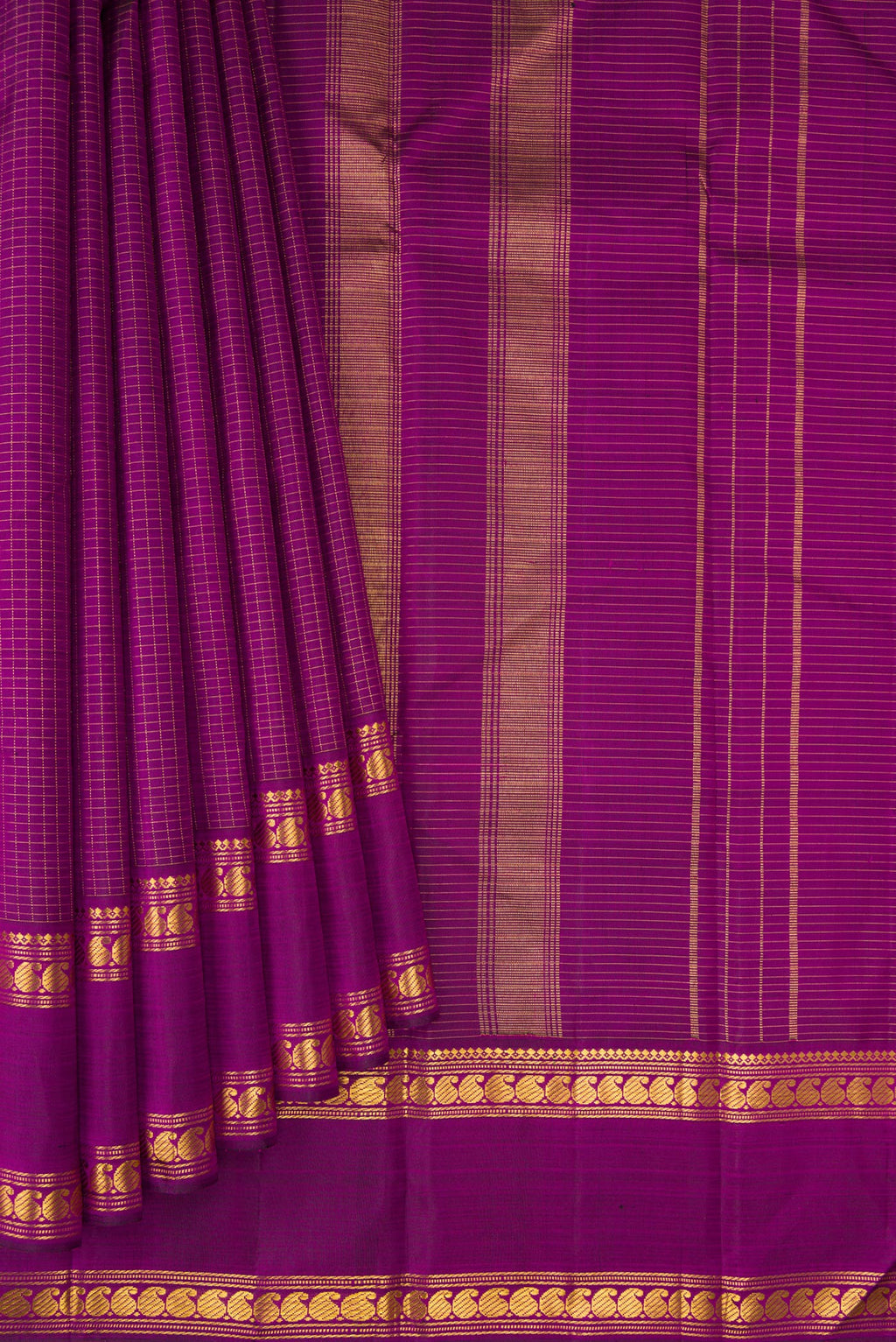 Pleats and pallu of Purple Kanchipuram Silk Saree with Checked design on the body and Zari Border. 