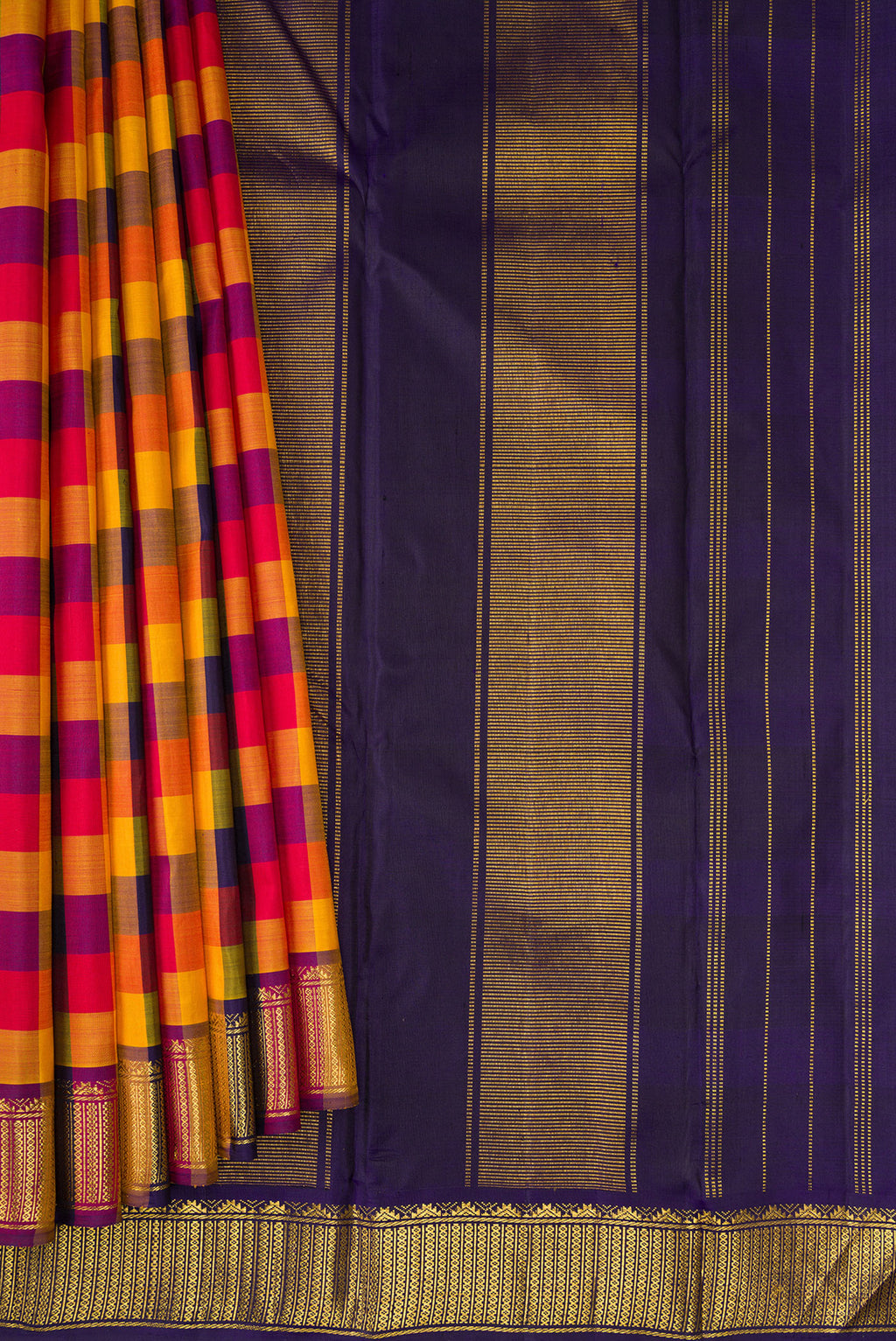 Pleats and pallu of Multi Color Kanchipuram Silk Saree with Checked design on the body and Zari Border. 