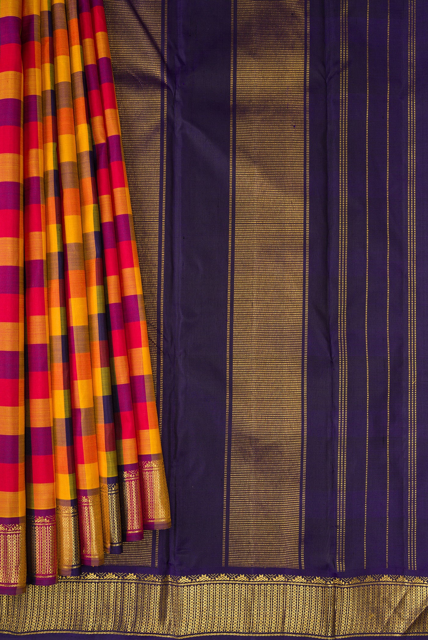 Pleats and pallu of Multi Color Kanchipuram Silk Saree with Checked design on the body and Zari Border. 