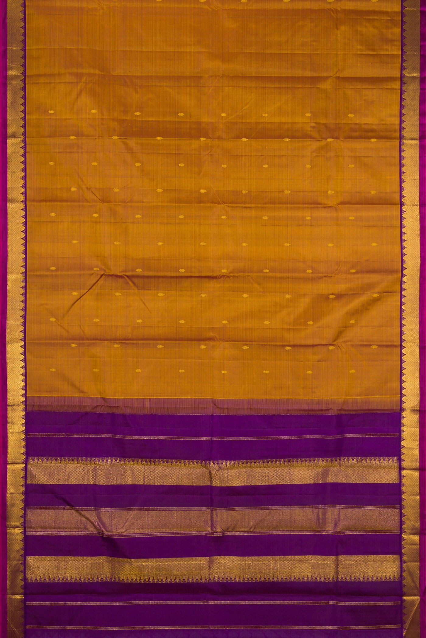 Flat view of Mehandi Green Dual Tone Kanchipuram Silk Saree with Zari Butta on the body and Zari Border. 