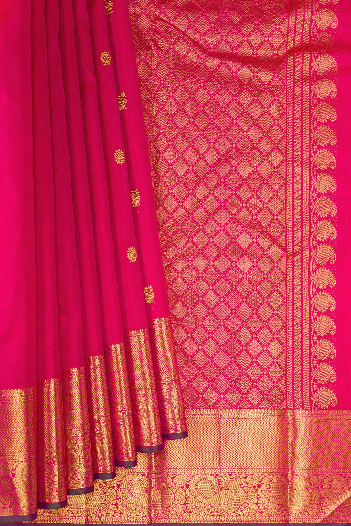 Pleats and pallu of Pink Kanjivaram Silk Saree with Zari Butta on the body and Zari Border. 