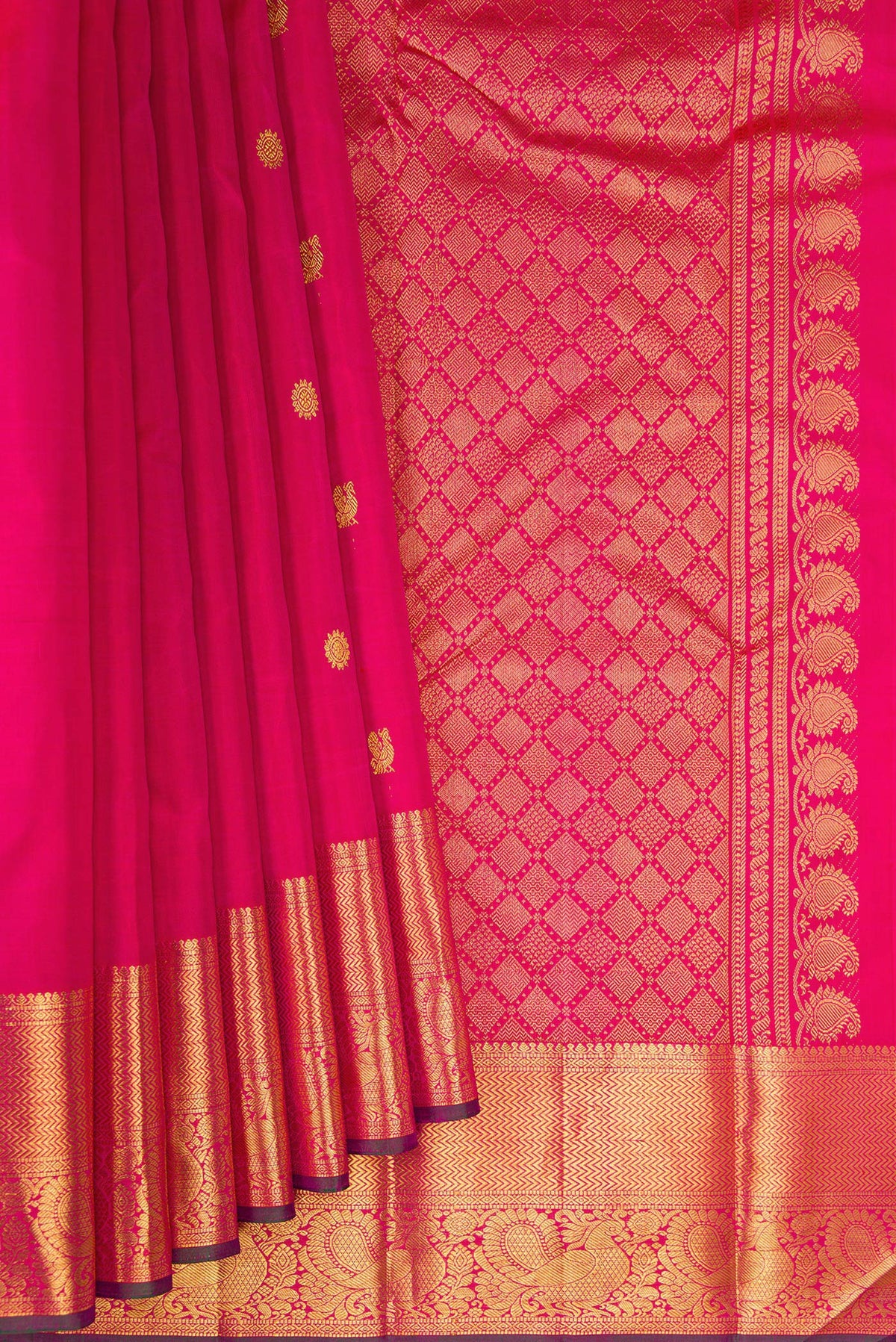 Pleats and pallu of Pink Kanjivaram Silk Saree with Zari Butta on the body and Zari Border. 