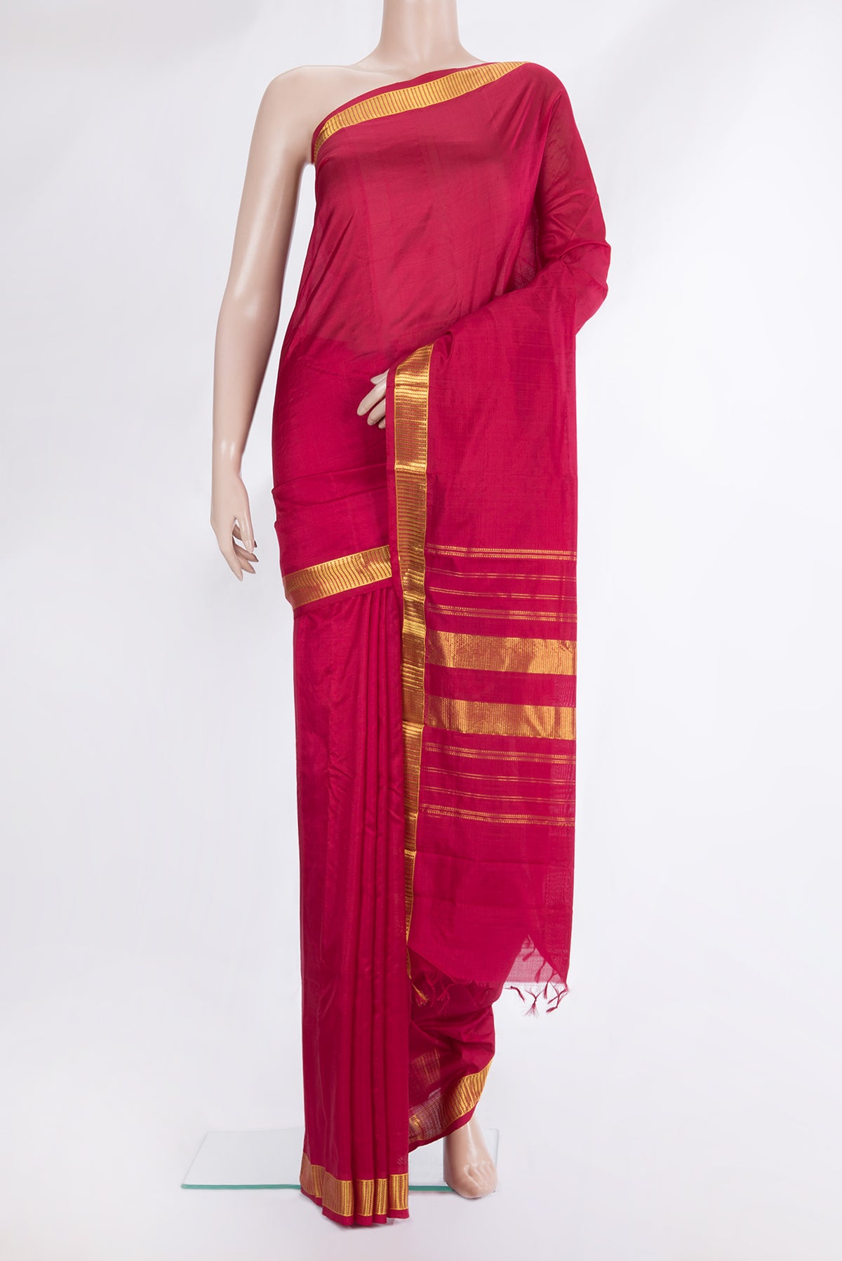 Pure Silk Red Kanjivaram Saree with Plain Body and Zari Border.  displayed on a mannequin