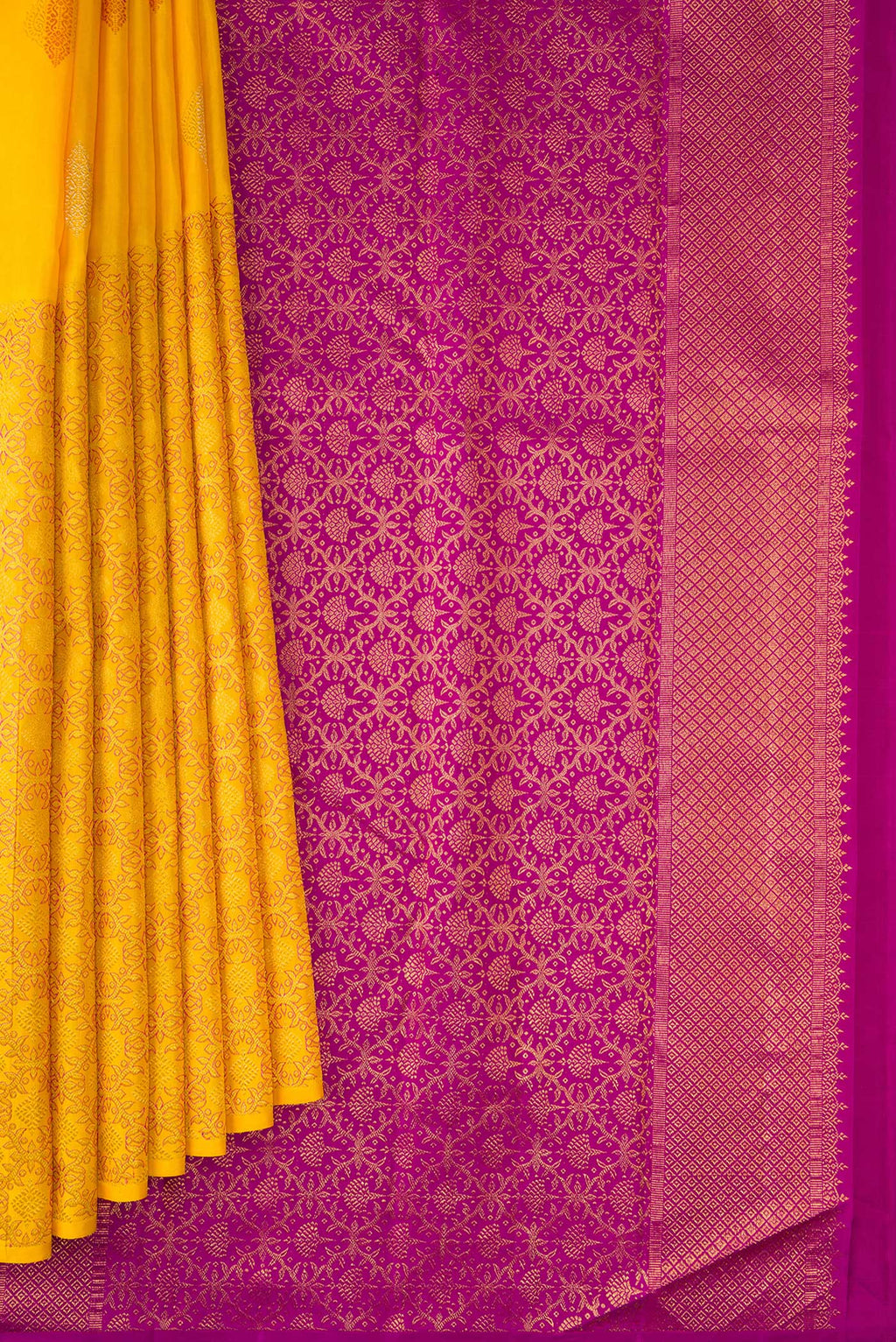 Pleats and pallu of Pure Silk Yellow Kanjivaram Saree with Zari Butta on the body and Without Border. 