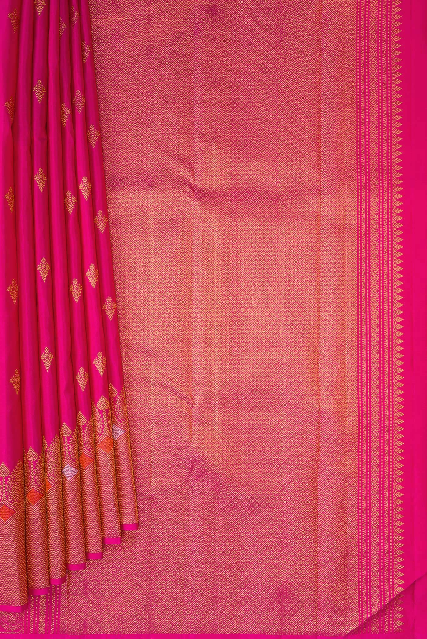 Pleats and pallu of Dark Pink Kanjivaram Silk Saree with Zari Butta on the body and Fancy Border. 