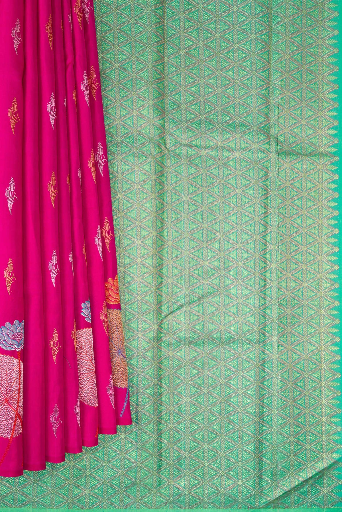 Pleats and pallu of Pure Silk Dark Pink Kanjivaram Saree with Zari Butta on the body and Without Border. 
